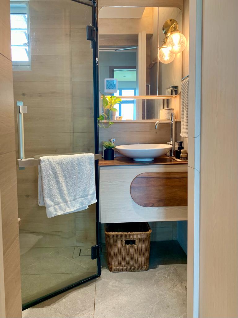 Japanese Inspired Interior | Bathrooms as a space to relax - Wooden shower enclosure, modern bathroom, white towel, wooden