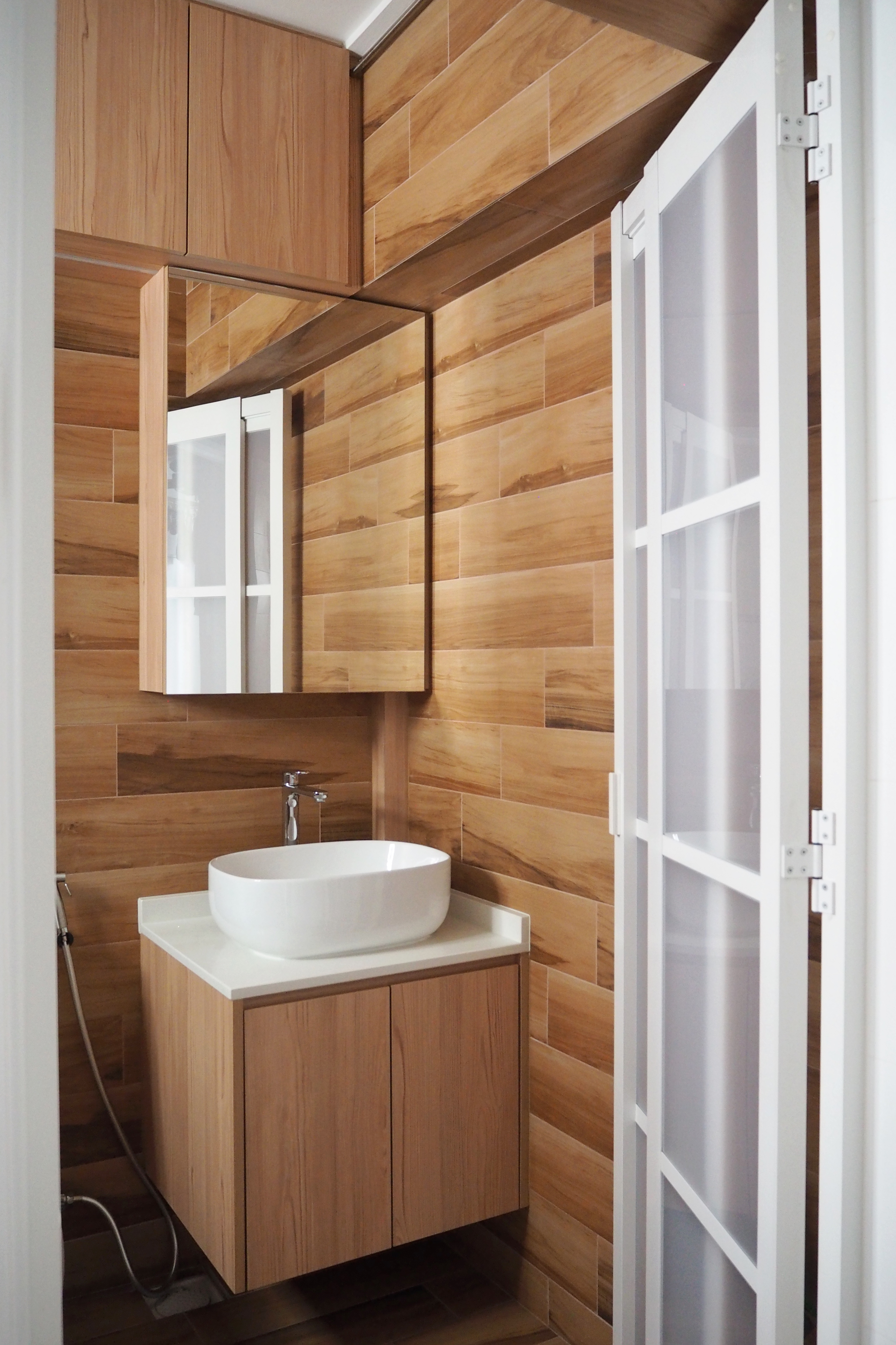 Bathrooms with Japanese Bath Vibes - Wooden cabinetry, modern design, minimalist aesthetic, floating vanity, white sink