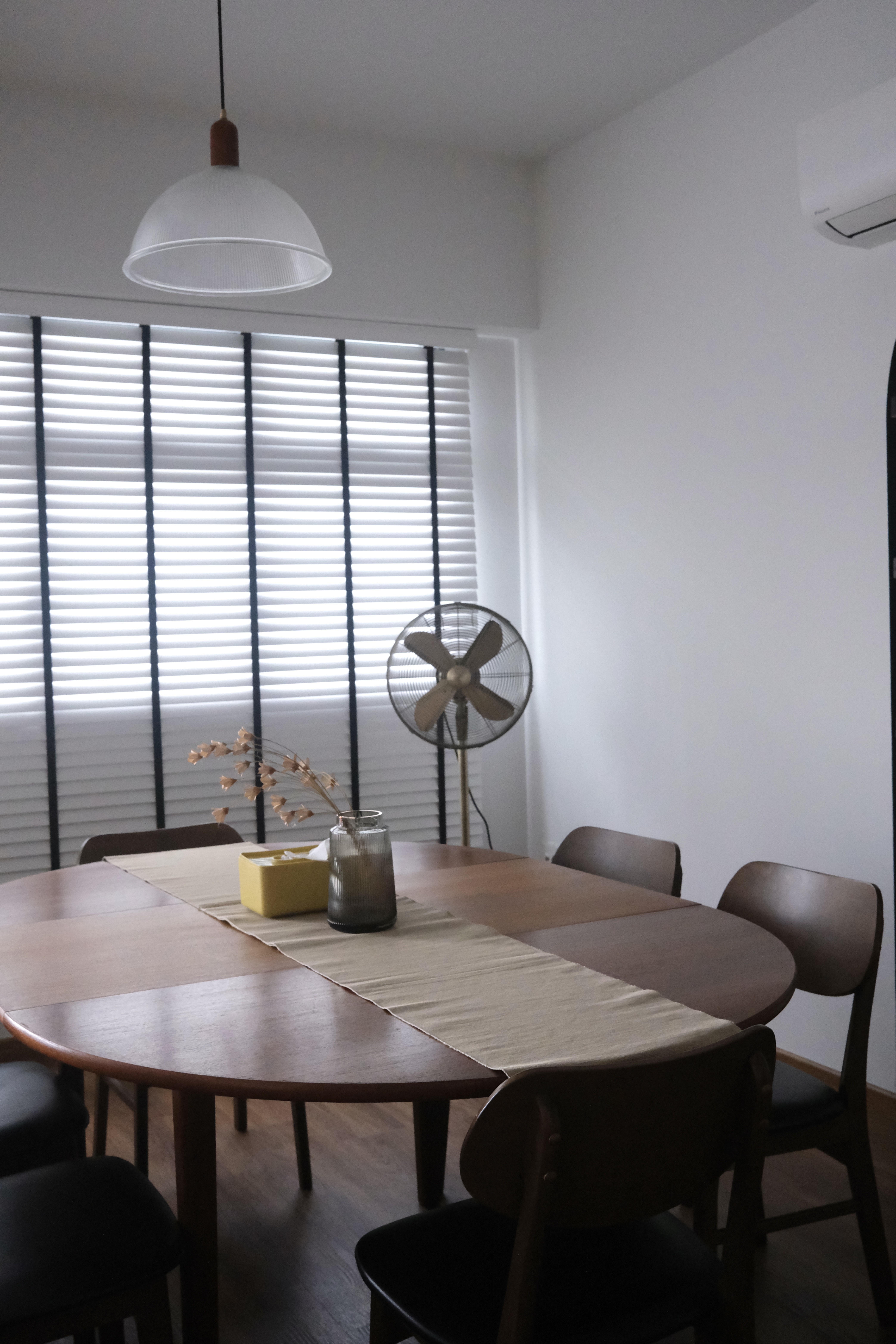 Dining Area | Where we work and relax  - Modern dining room with wooden table and chairs, beige table runner, large window