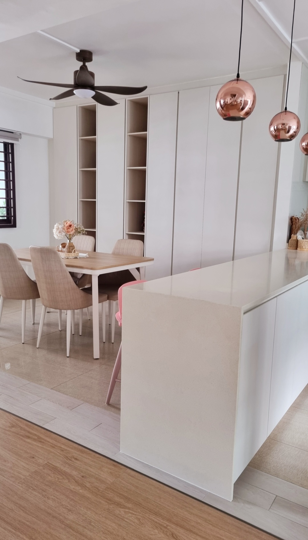MORE THAN just a Dining Area - Modern kitchen with minimalist design, white cabinets and countertops, pendant lights with
