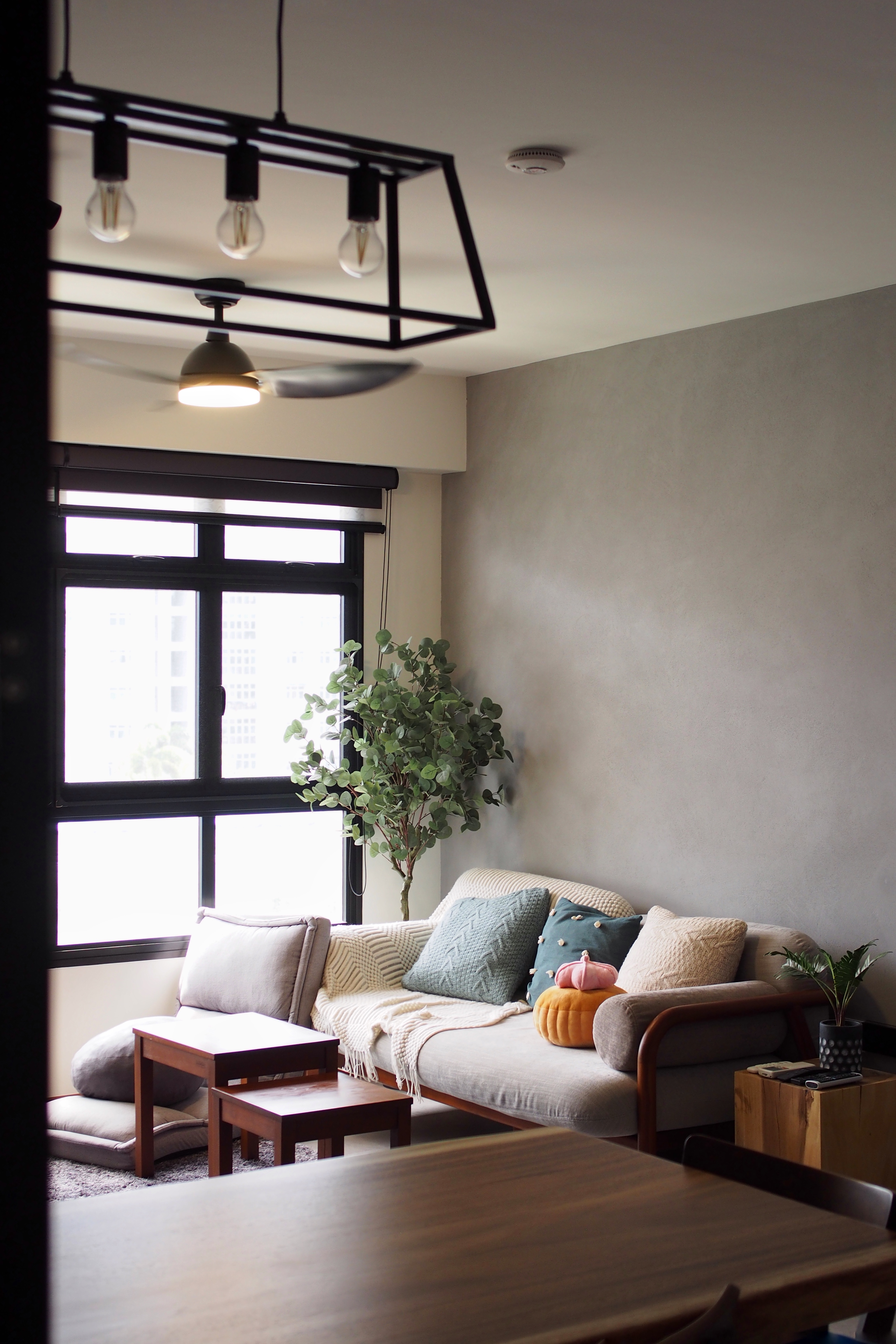 Styling a living room with 0 built-ins - Modern living room with comfortable seating, large window with natural light