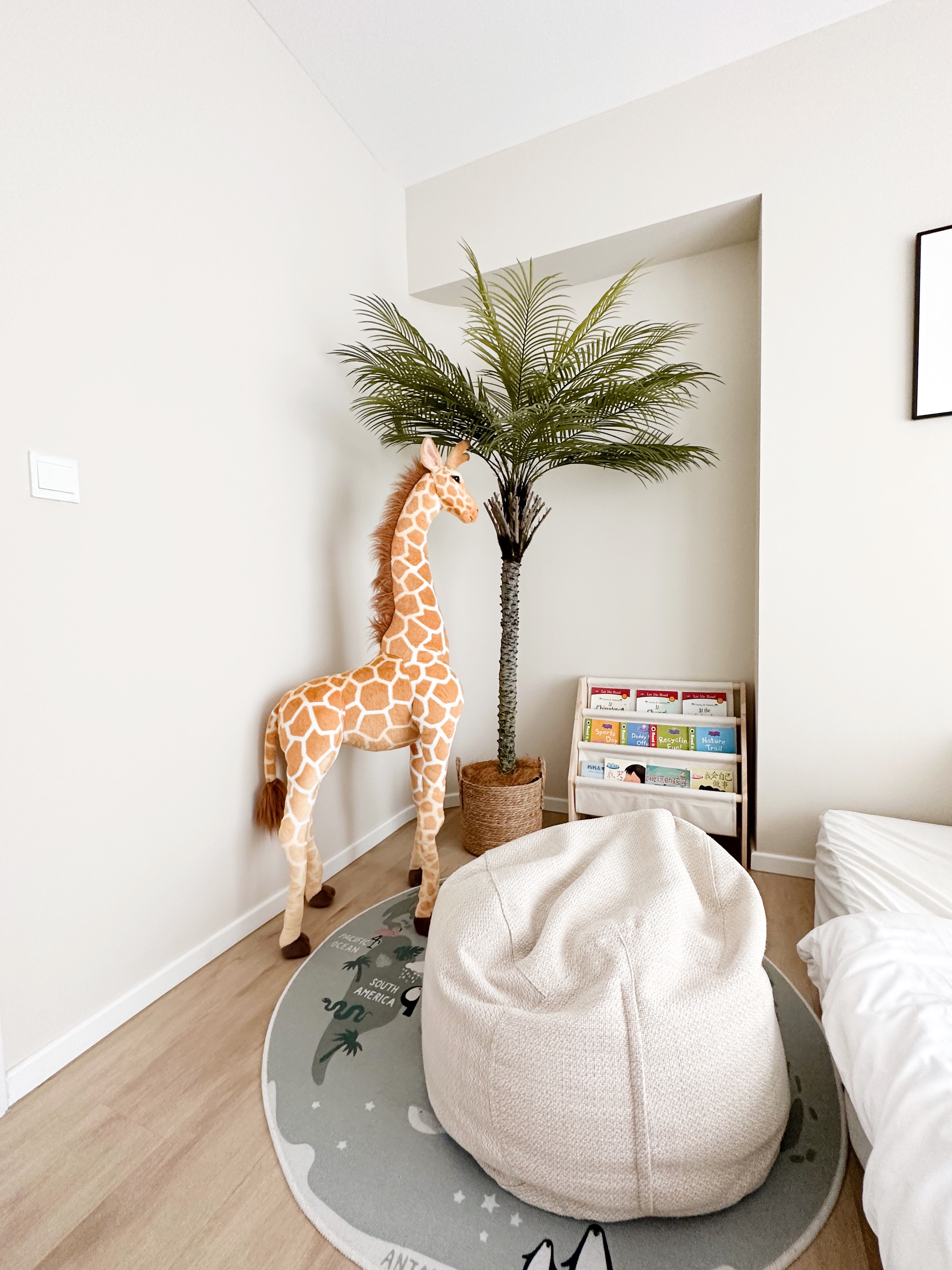 Fun & Cozy Safari Themed Kids’ Room 🌿🦒🦓 - Giraffe toy, indoor setting, room decor, potted plant, beige wall, white