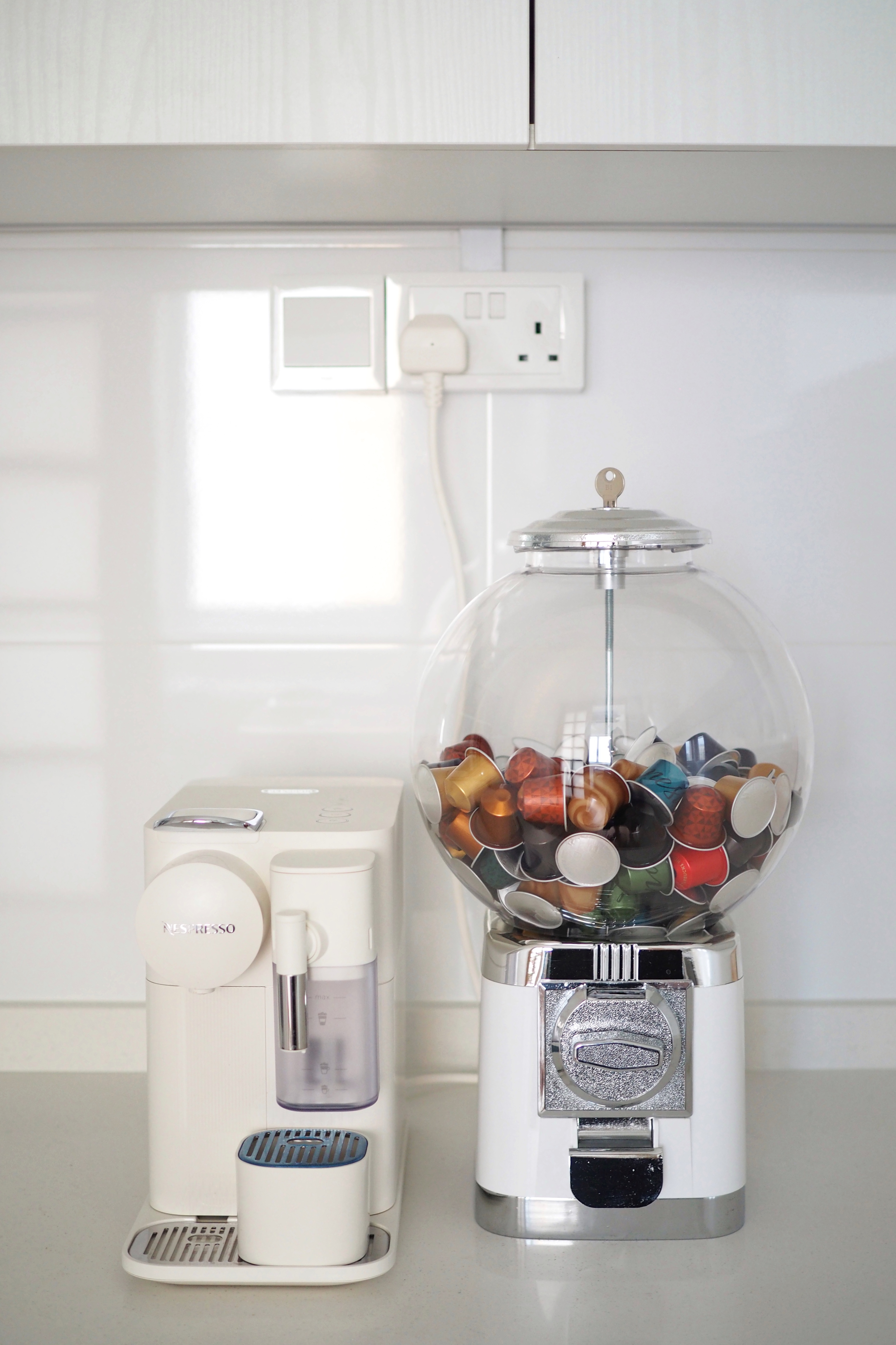 Kitchen for Coffee Lovers - glass coffee pod dispenser, modern kitchen counter, white coffee machine, Nespresso, glass dome