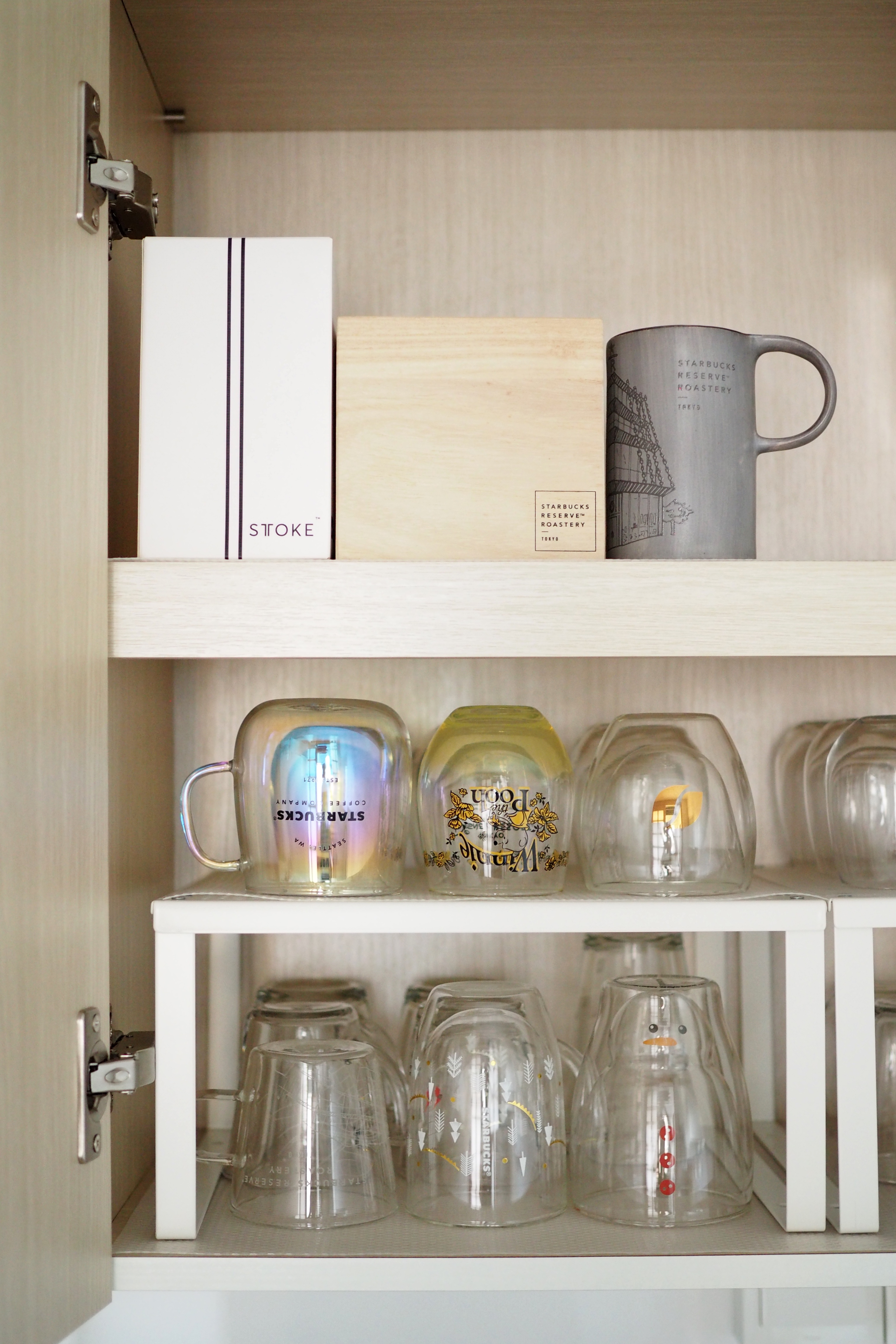 Kitchen for Coffee Lovers - Clear glass mugs, Starbucks mug, coffee shop theme, wooden shelves, minimalist design, modern