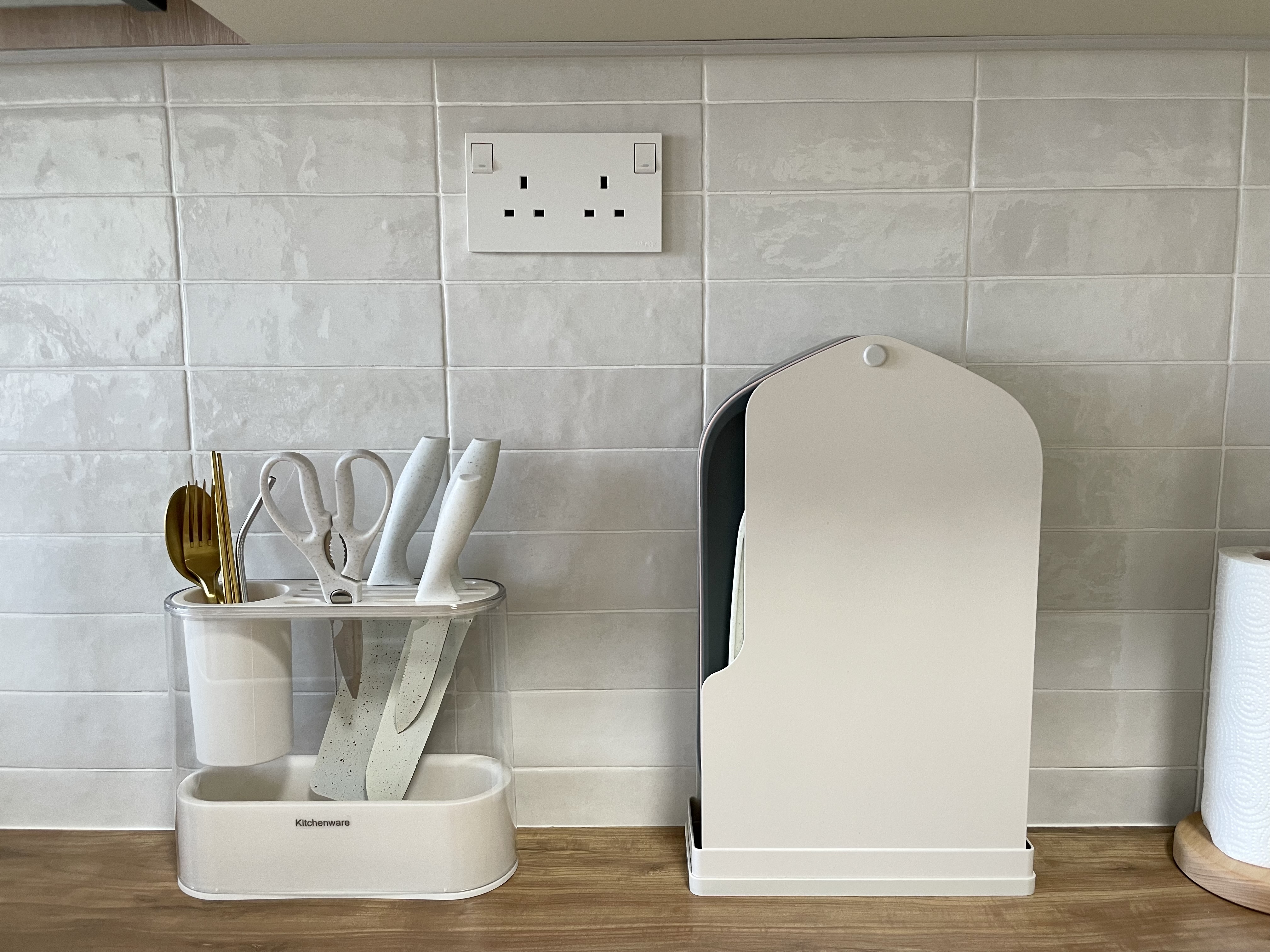 Kitchen organization with a balance for aesthetic - Clear white kitchen tiles, modern kitchen countertop, white kitchenware