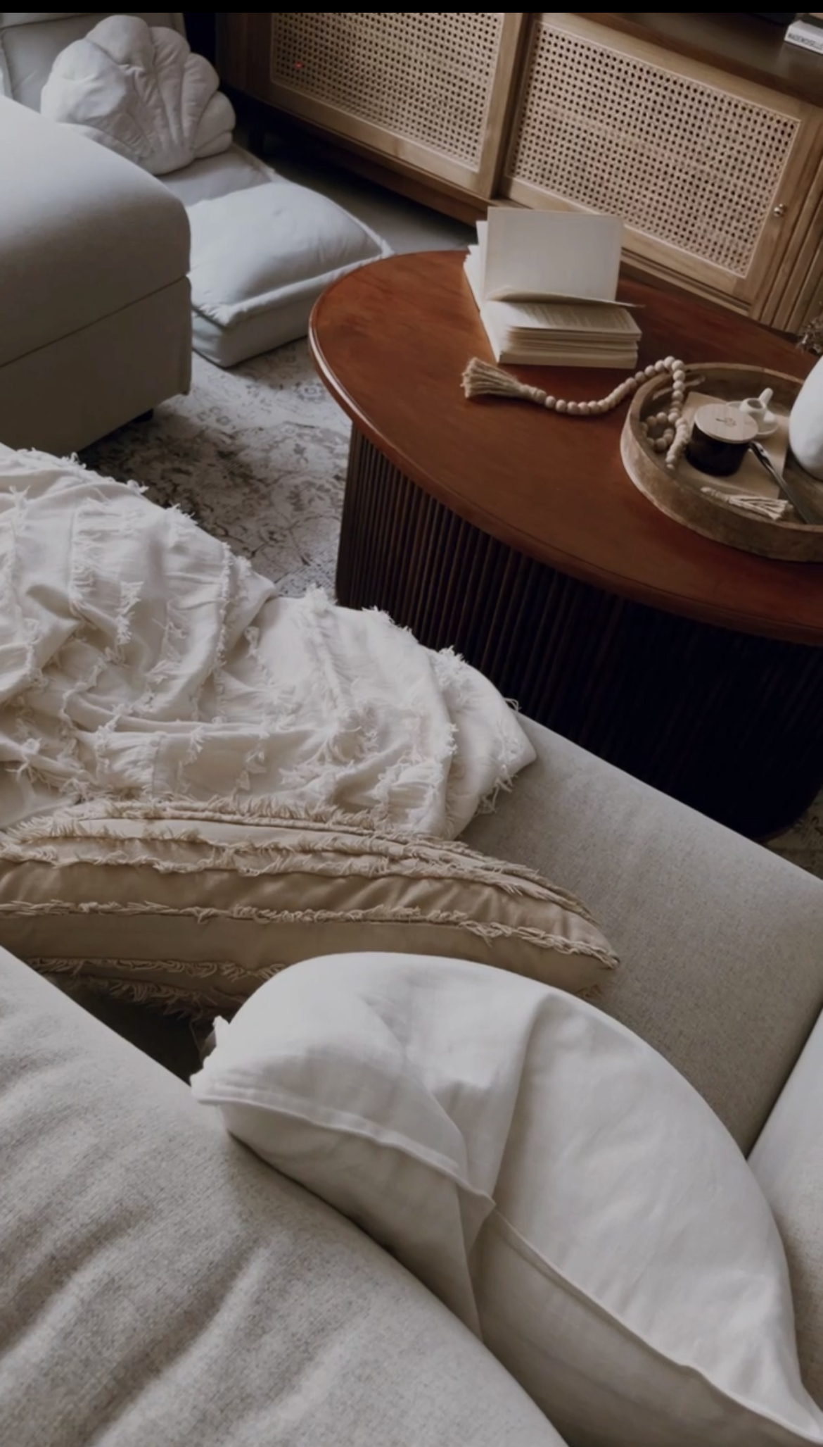 This is where we gather and connect ! - Cream sofa, white pillows, soft throw blanket, wooden coffee table, elegant decor