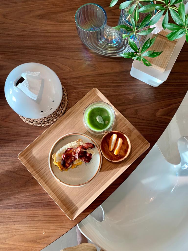 Japanese Inspired Interior | Dining Room with hidden storages - glass coffee cup, green smoothie, bacon, breakfast, plate