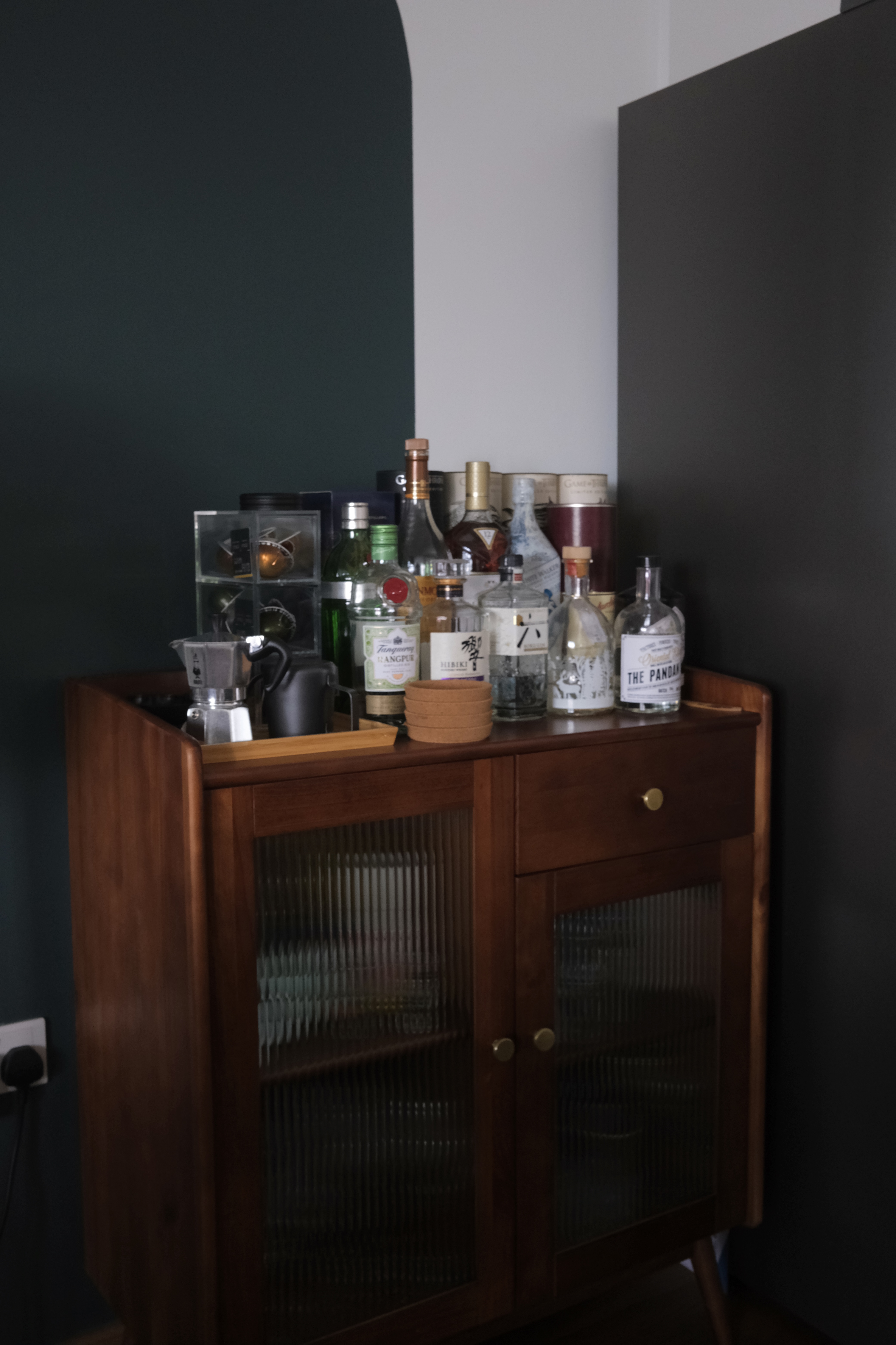 Keeping Our Open Kitchen Well Organised | Where we hide the unsightly - Wooden cabinet, dark green wall, glass cabinet doors