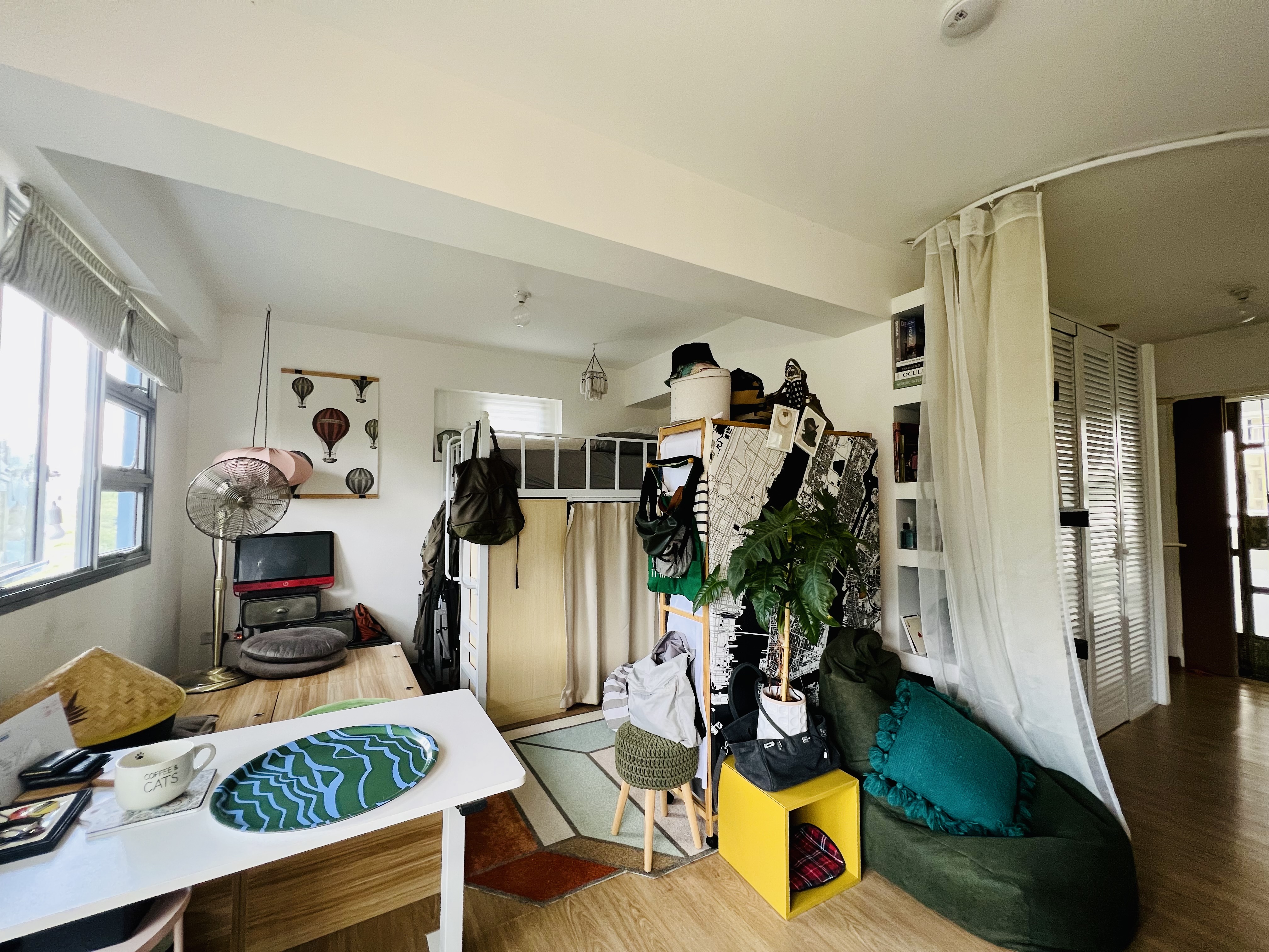 A Maximalist Haven ❤️ - Bustier room, cozy living space, modern decor, white walls, large window, wooden floor, green couch