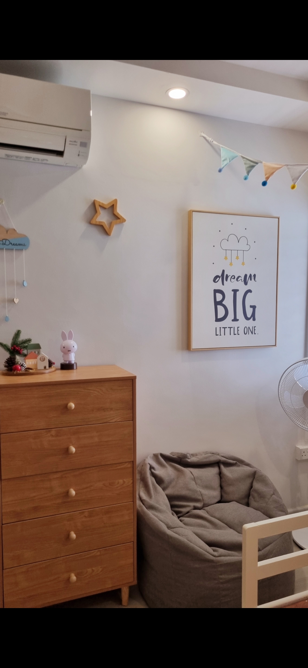 Gender Neutral KIDS bedroom - Wooden dresser, minimalist decor, cozy room, small rug, gray bean bag, white fan, star