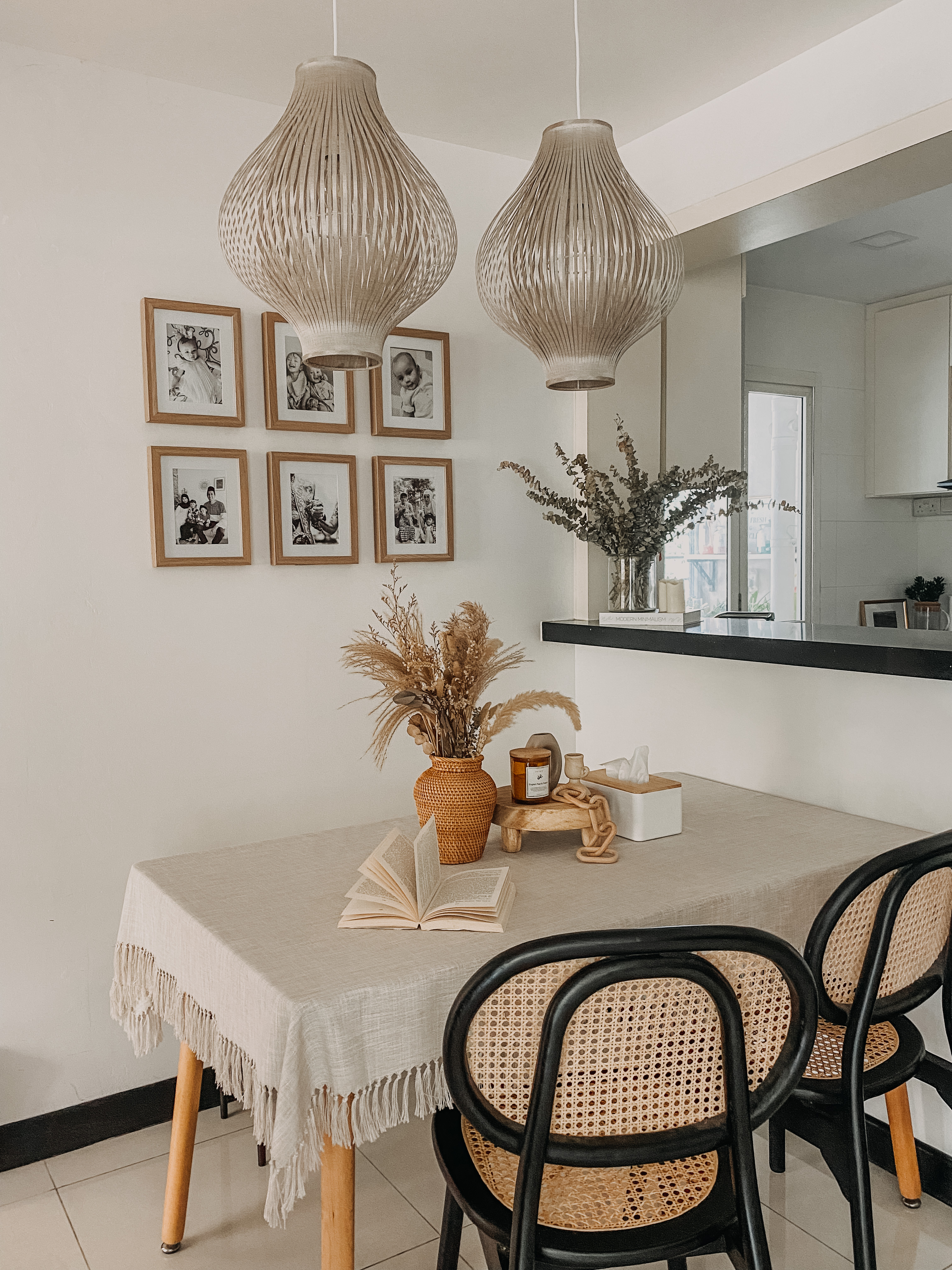 Check out the transformation of our dining area ! - Modern dining room, minimalist decor, woven pendant lights, framed family