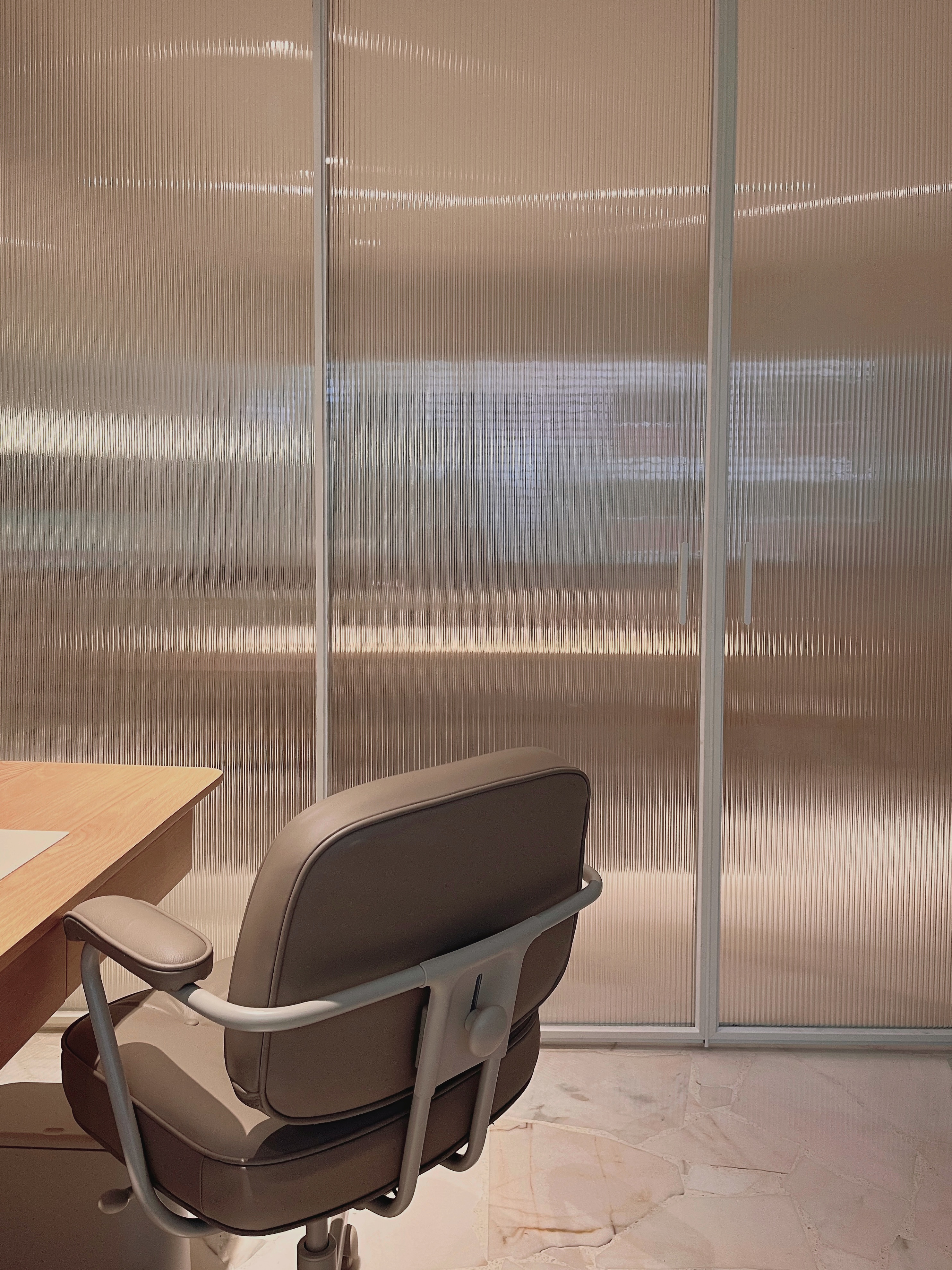 Maximalist, light-filled study with zero built-ins  - Modern office interior, minimalist design, sleek chair, wooden desk