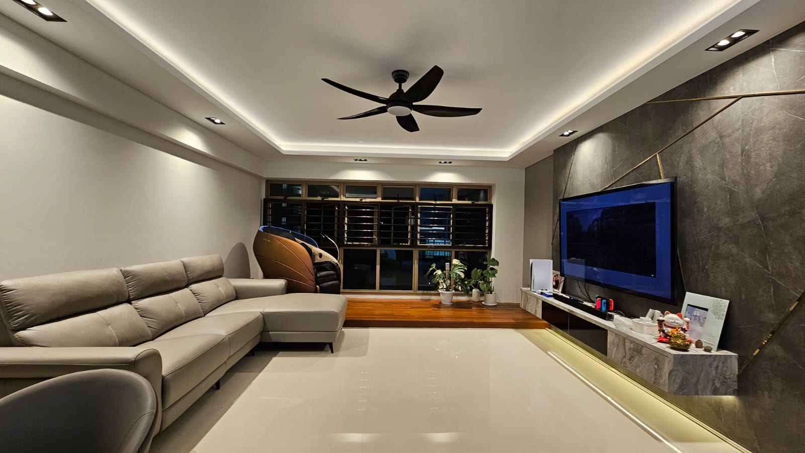 Chic Simplicity: Tranquil Beauty of Grey and White - Modern living room with sleek design, beige sectional sofa, black