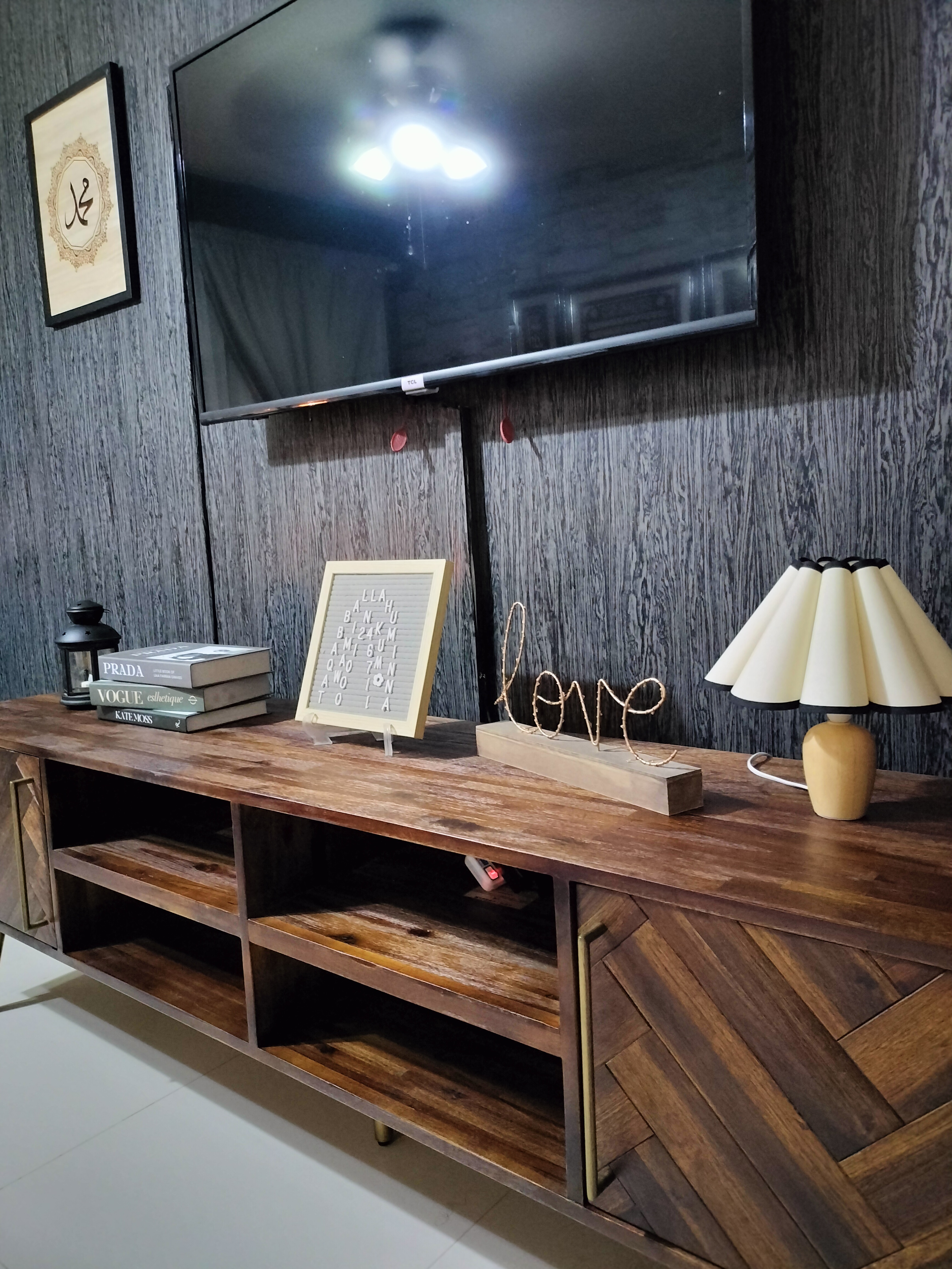 The focal point in the living room  - Wooden TV cabinet, modern decor, dark wood finish, herringbone pattern, minimalist
