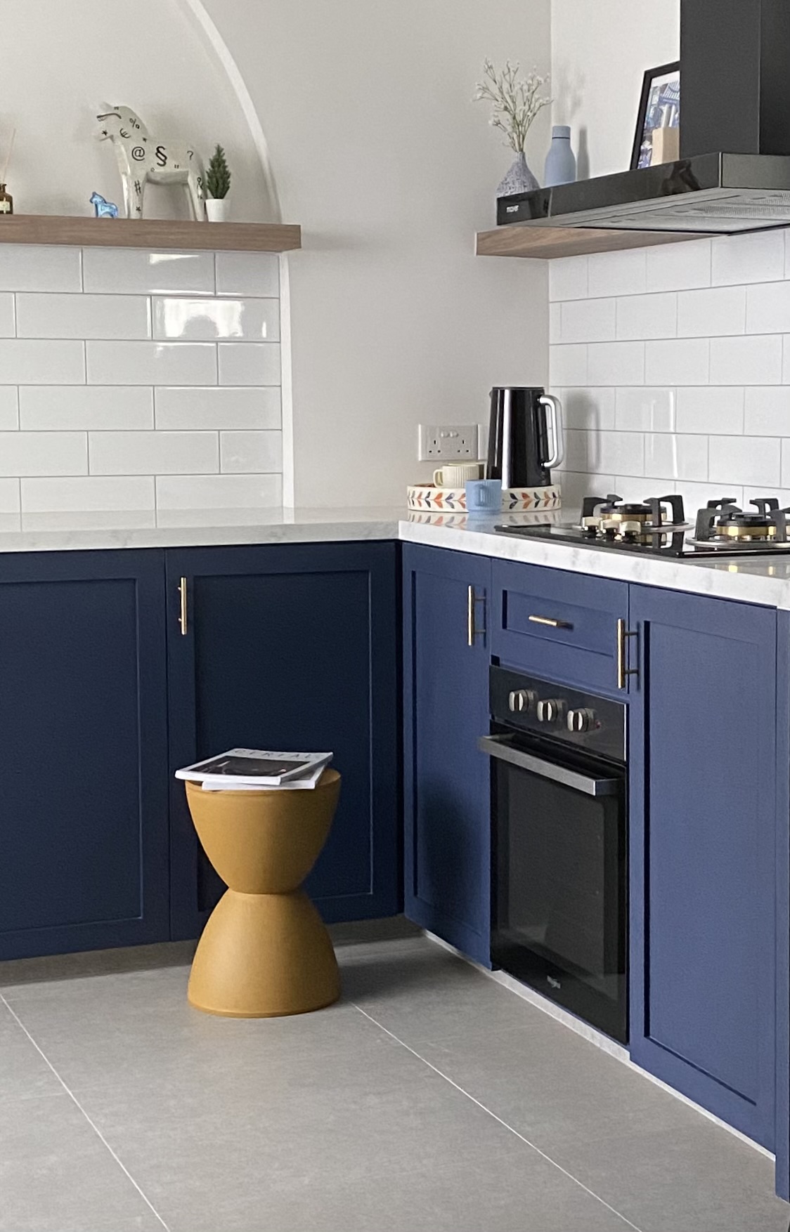 Step into our dwelling - a mixture of styles!  - blue kitchen cabinetry, modern design, dark blue cabinets, white tiled