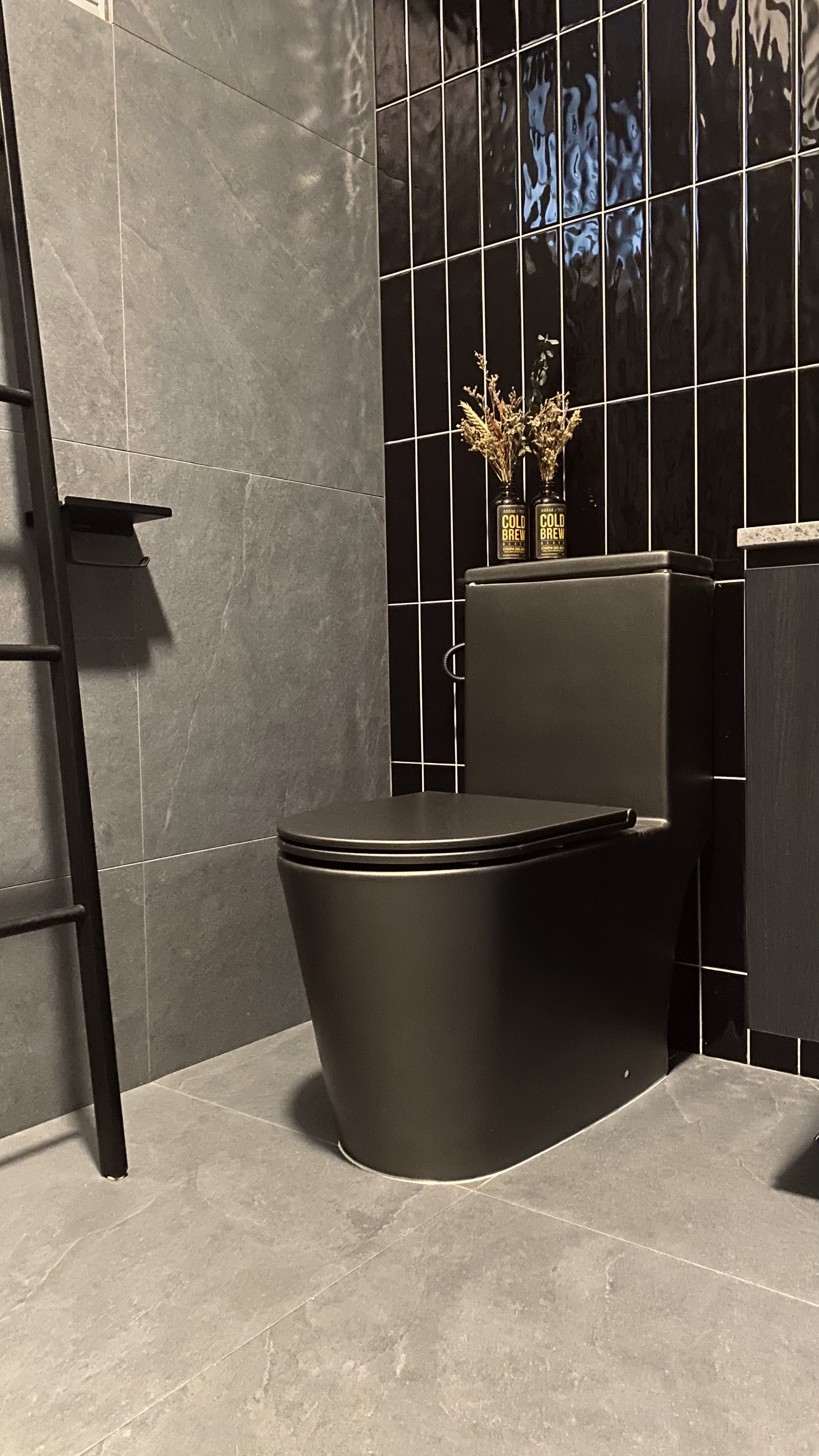 Step into our dwelling - a mixture of styles!  - modern bathroom, sleek toilet, black tiles, minimalist design, contemporary
