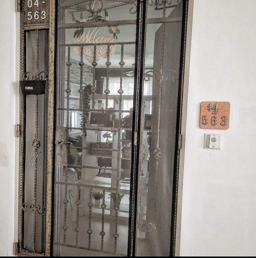 #SGhomestories - Thekilabrets haven👋 - Intricate metal gate with decorative bars, Vintage-style glass door with ornate