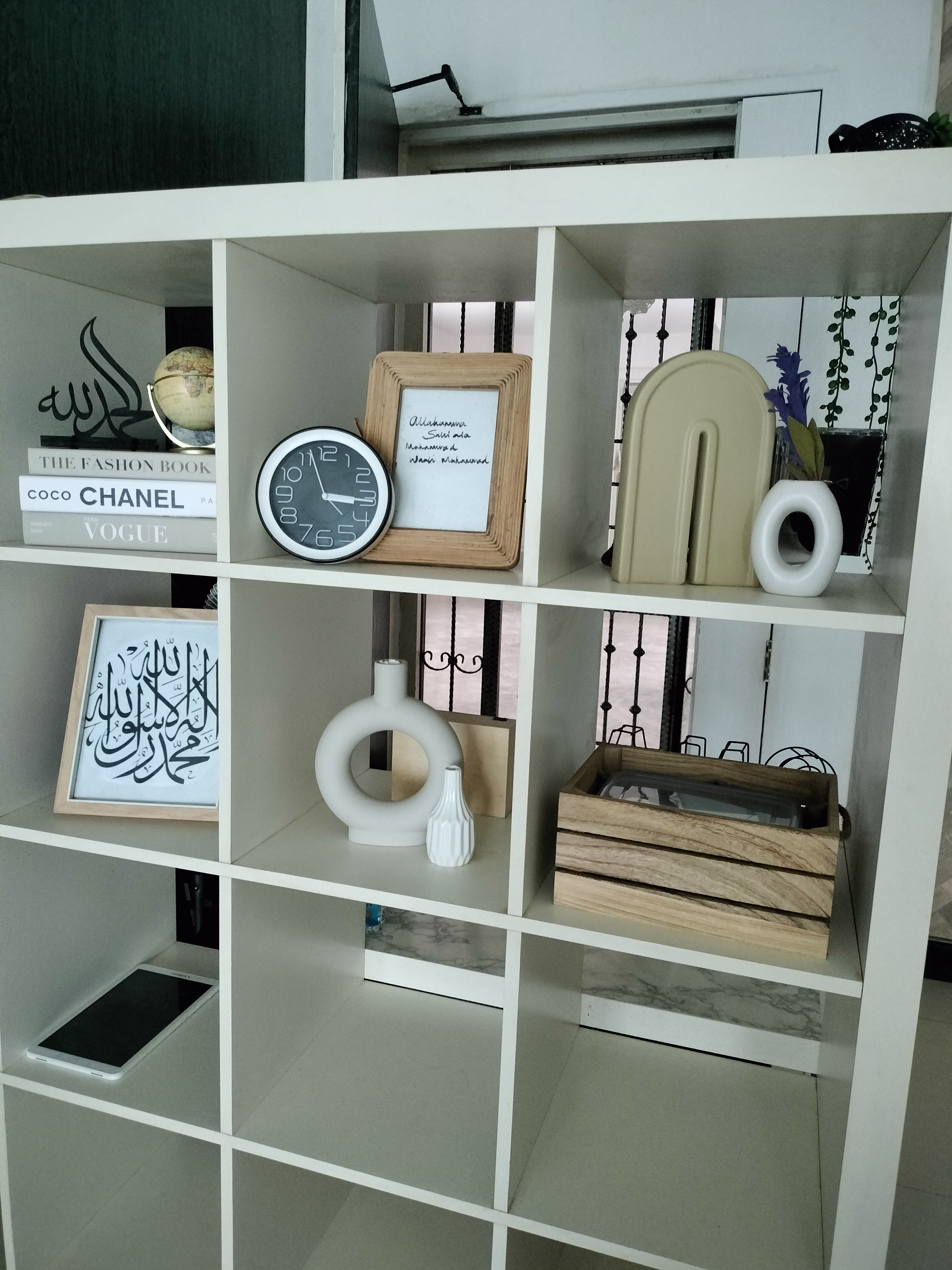 #SGhomestories - Thekilabrets haven👋 - fashion book, clock, Arabic calligraphy, white shelf, decorative items, globe, clock