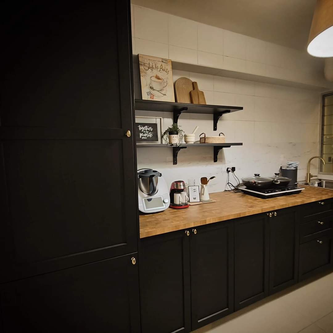 #SGhomestories - Thekilabrets haven👋 - Dark kitchen cabinetry, modern appliances, wooden countertop, black shelving, coffee