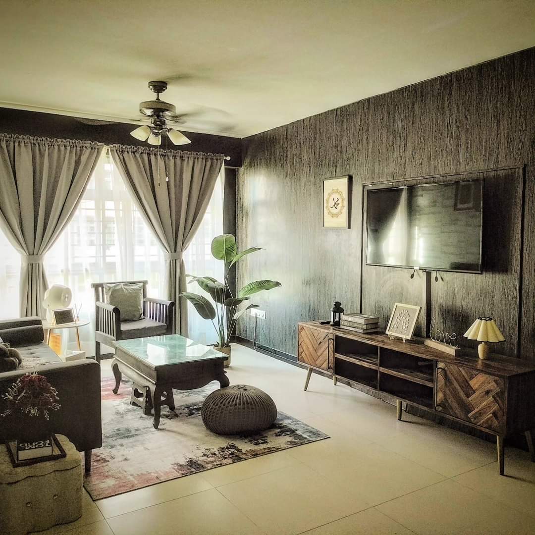 #SGhomestories - Thekilabrets haven👋 - modern living room, cozy seating, glass coffee table, dark wood entertainment center