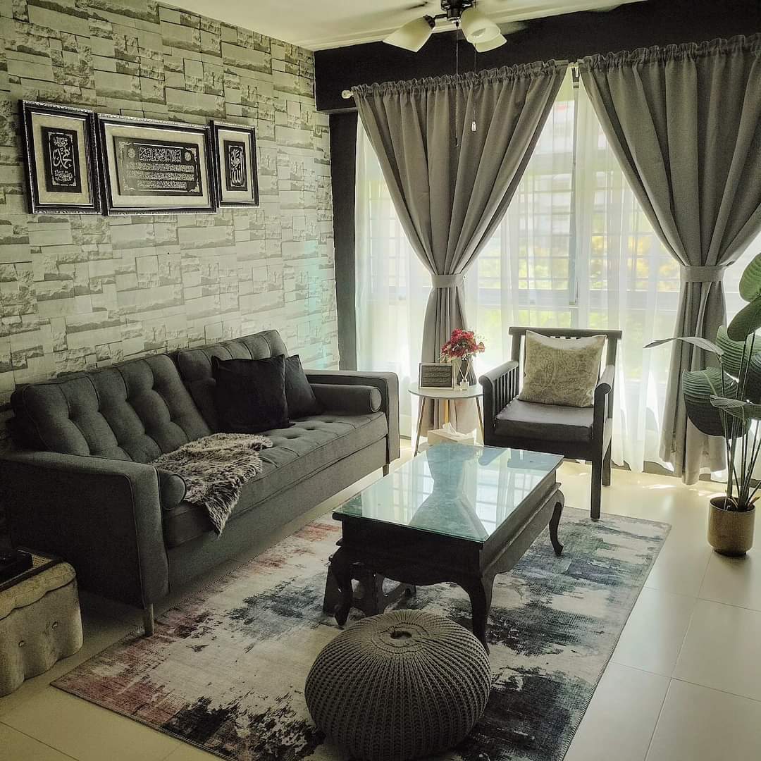 #SGhomestories - Thekilabrets haven👋 - Grey tufted sofa, black pillows, textured rug, modern decor, framed quotes, large