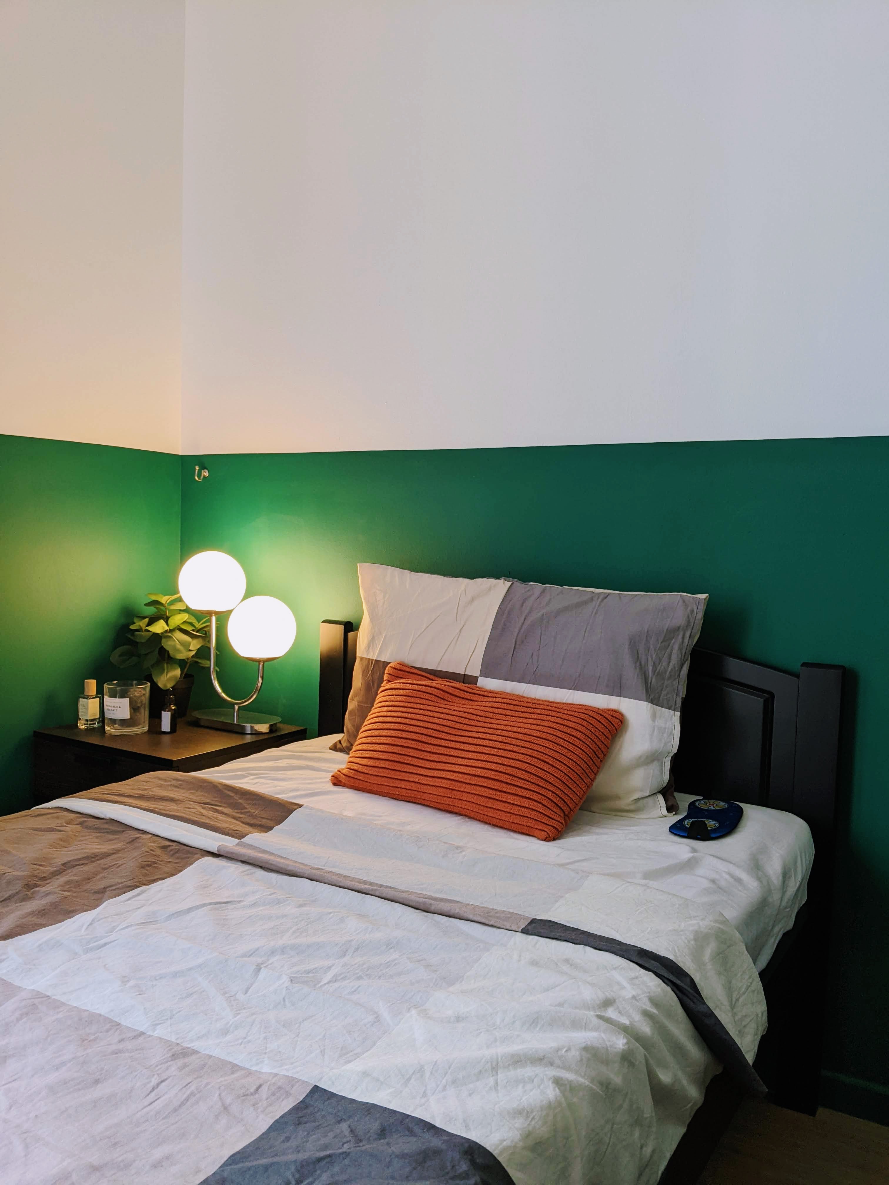 Optimizing Our Small Master Bedroom's Space - Green and white wall, modern decor, orange throw pillow, white and gray