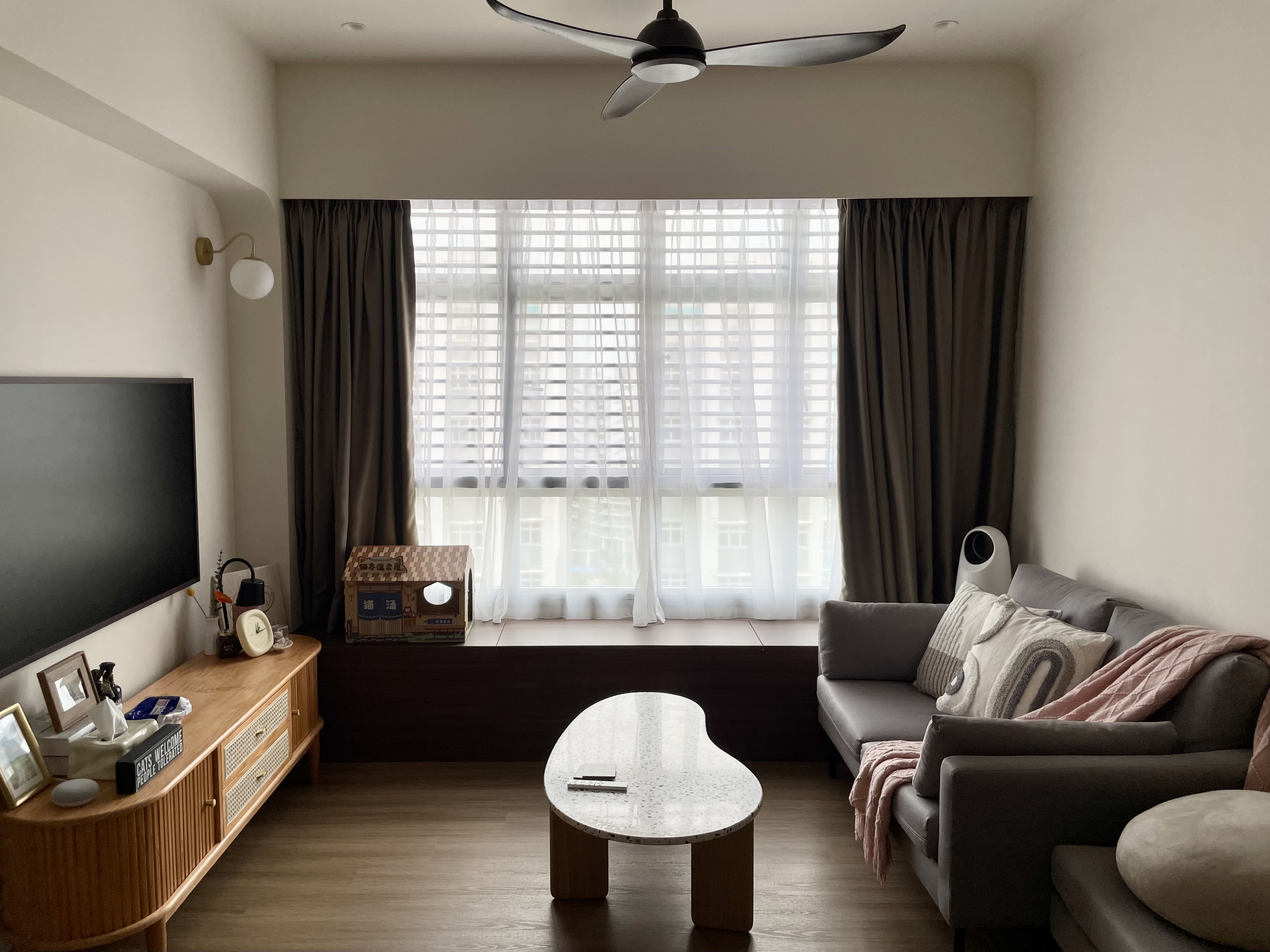 Curves, Wood and Greys in Living Room