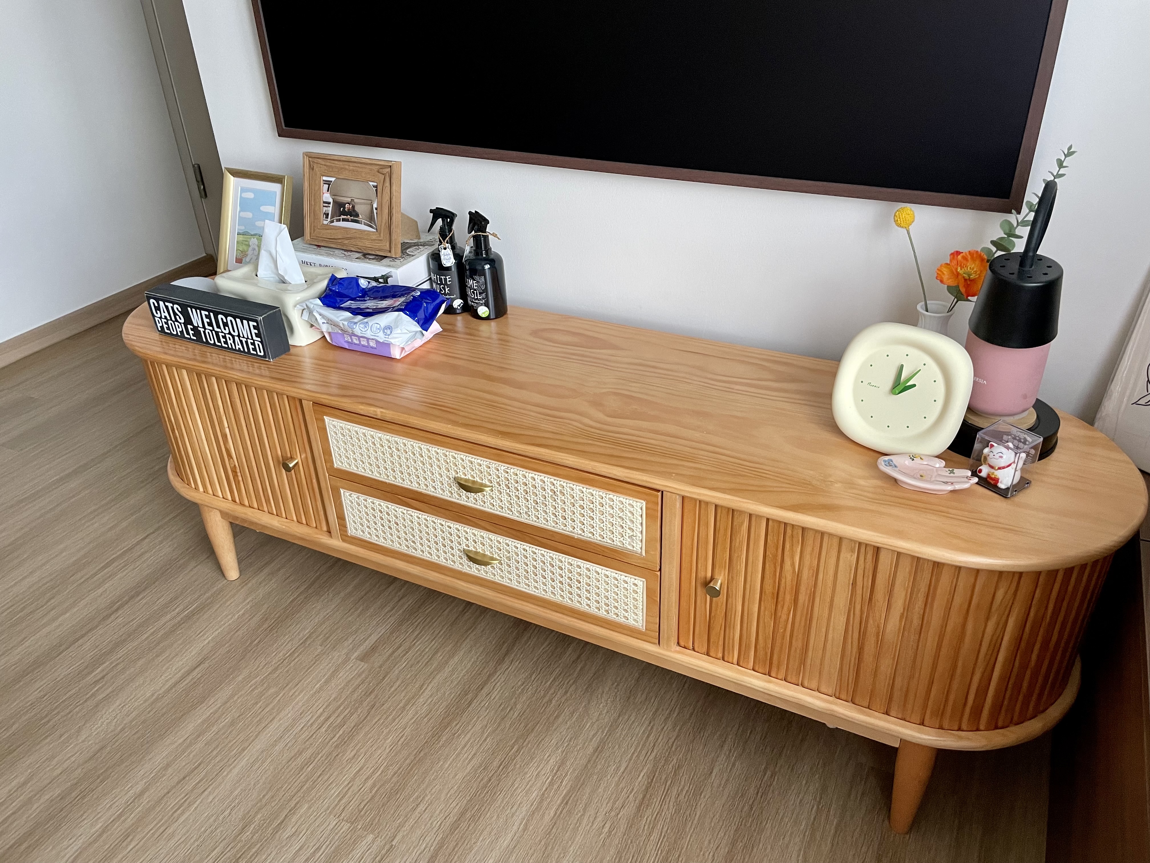 Curves, Wood and Greys in Living Room  - Wooden dresser, minimalist design, light wood finish, two drawers, white woven