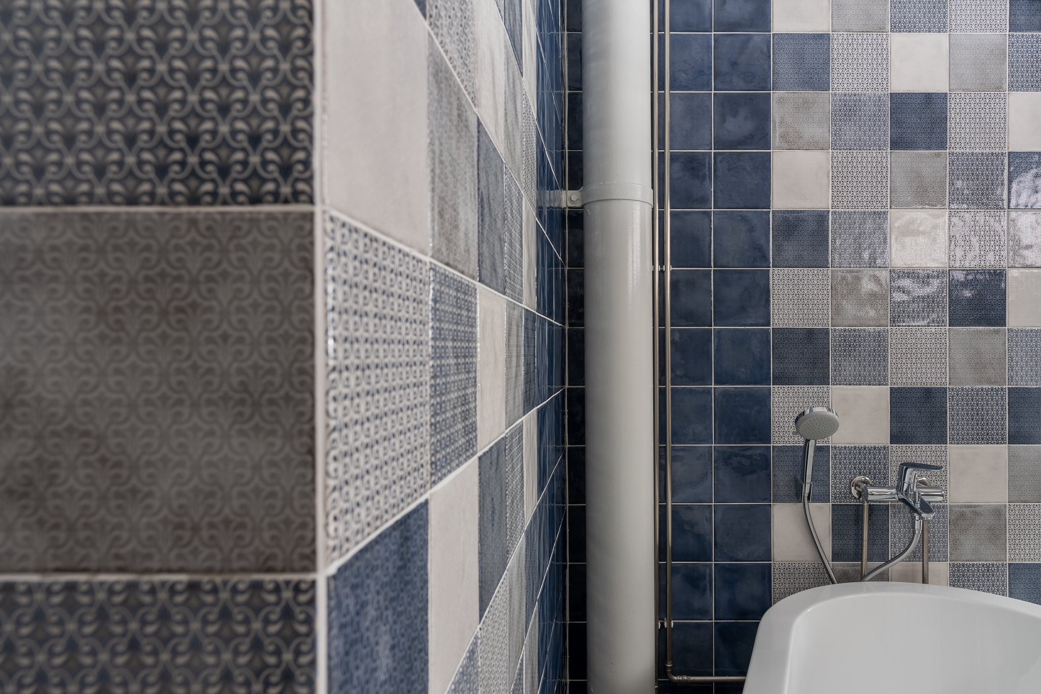 Supersizing Our Bathroom - Blue and gray tiled wall, modern bathroom, textured tiles, patterned tiles, decorative tiles