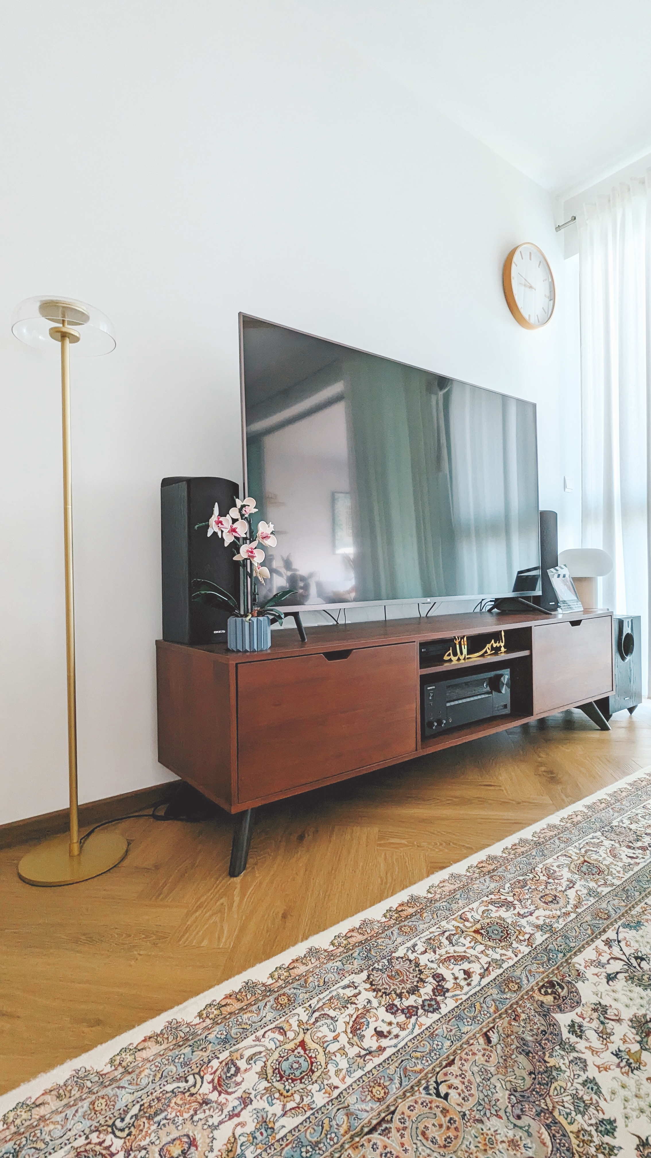 Walk about our quirky, catto-loving space. - Modern living room, minimalist decor, wooden TV stand, large flat-screen TV