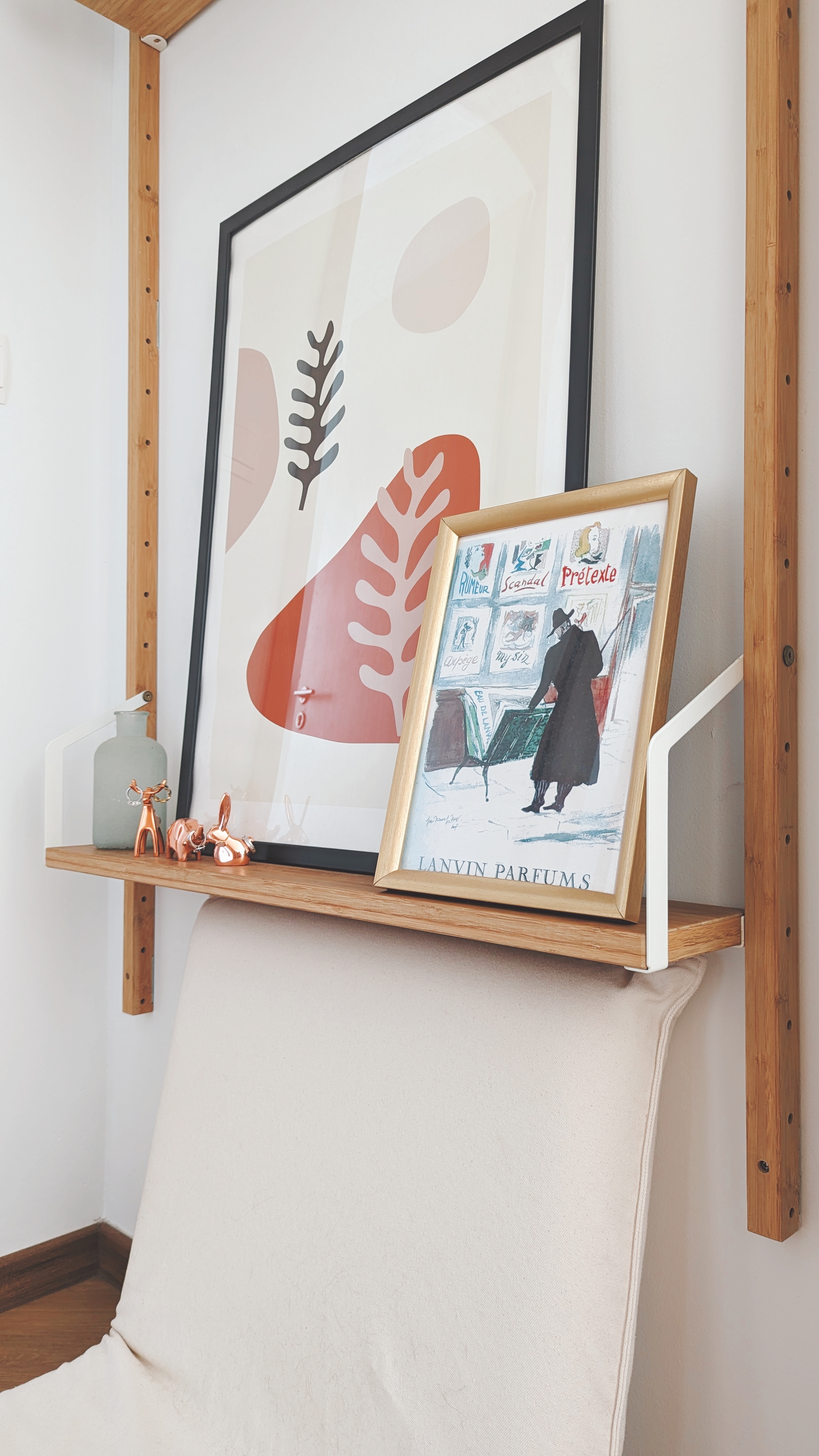 Walk about our quirky, catto-loving space. - Modern minimalist decor, abstract art, framed pictures, wooden shelf, copper