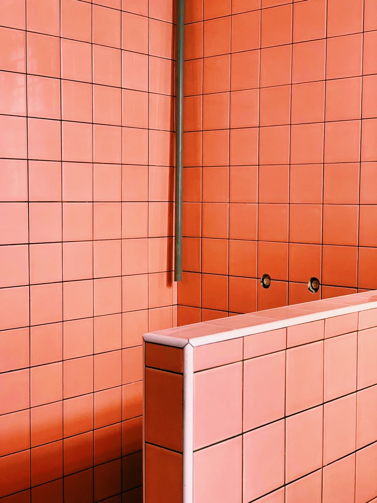 Where Every Bathroom Break is a Mini Getaway! - Orange-tiled bathroom wall, pink tiles, square tiles, glossy tiles, modern