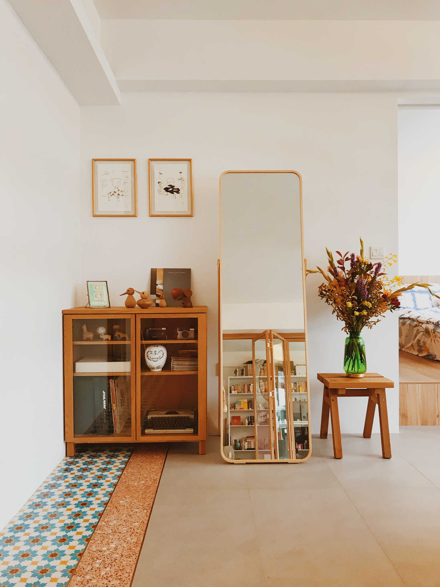 From Living Room to Entertainment Central: The Ultimate Transformation - Wooden cabinet, glass doors, decorative items