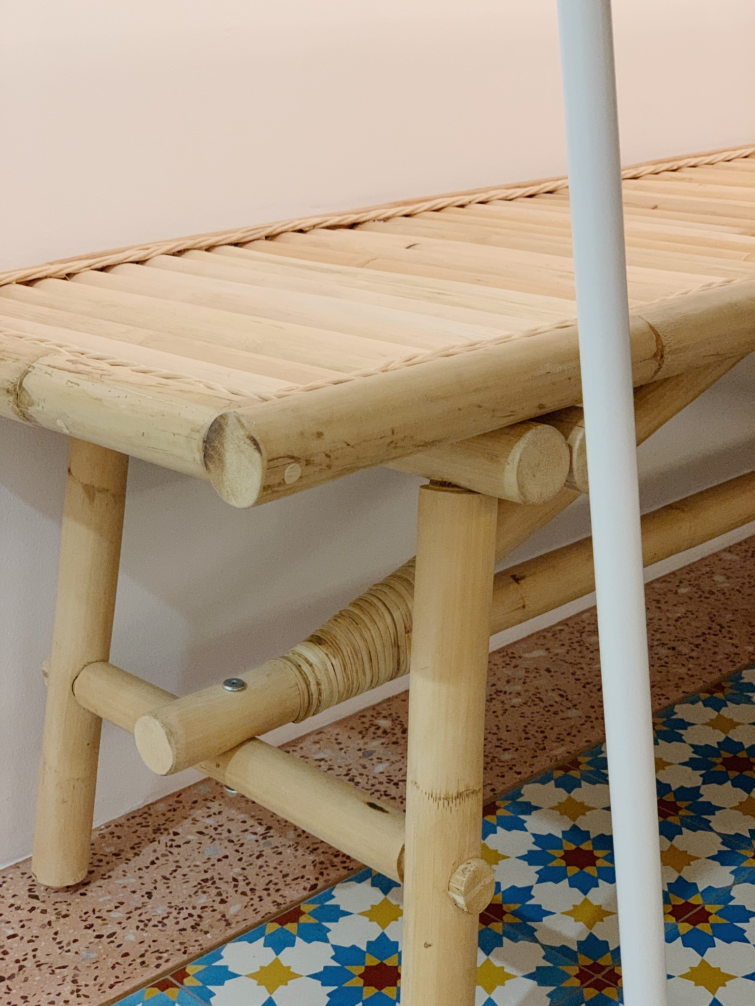 Epic Feasts and Growing Bonds: Our Dining Table's Journey to Grandeur - bamboo bench, natural wood, woven design, rustic