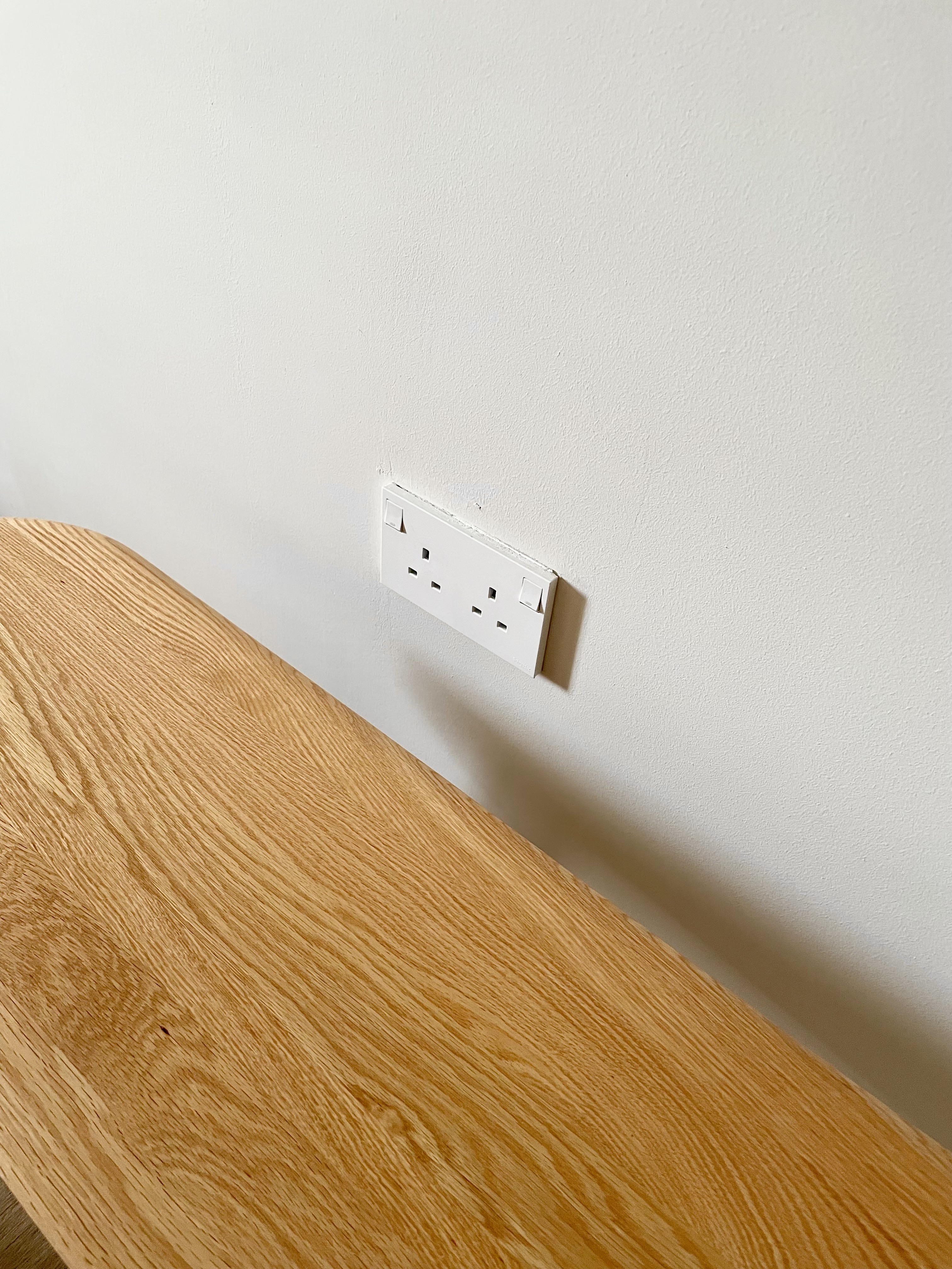 Japandi style dining area  - Wooden table, minimalist design, natural wood grain, light brown finish, sleek surface, smooth