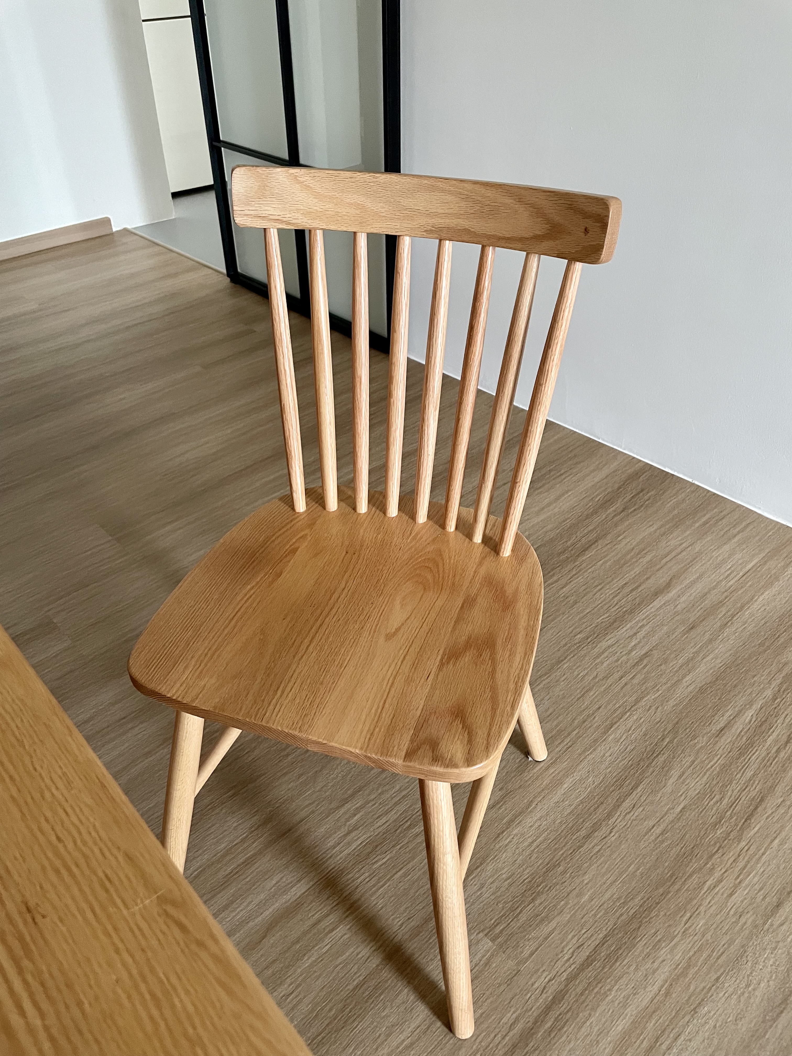 Japandi style dining area  - Wooden chair, minimalist design, natural wood finish, light brown color, sturdy construction