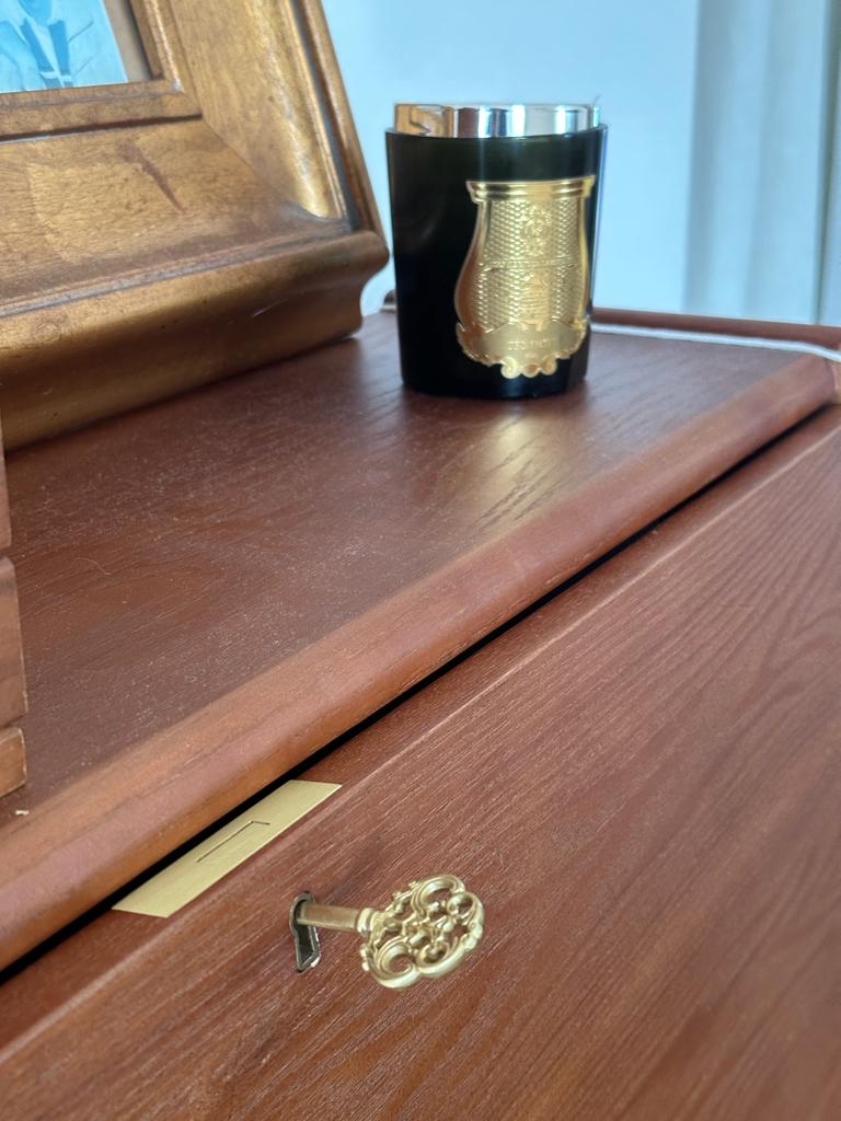 styling bedroom with existing furniture - Gold-colored brass key, wooden drawer, elegant brass keyring, vintage brass charm
