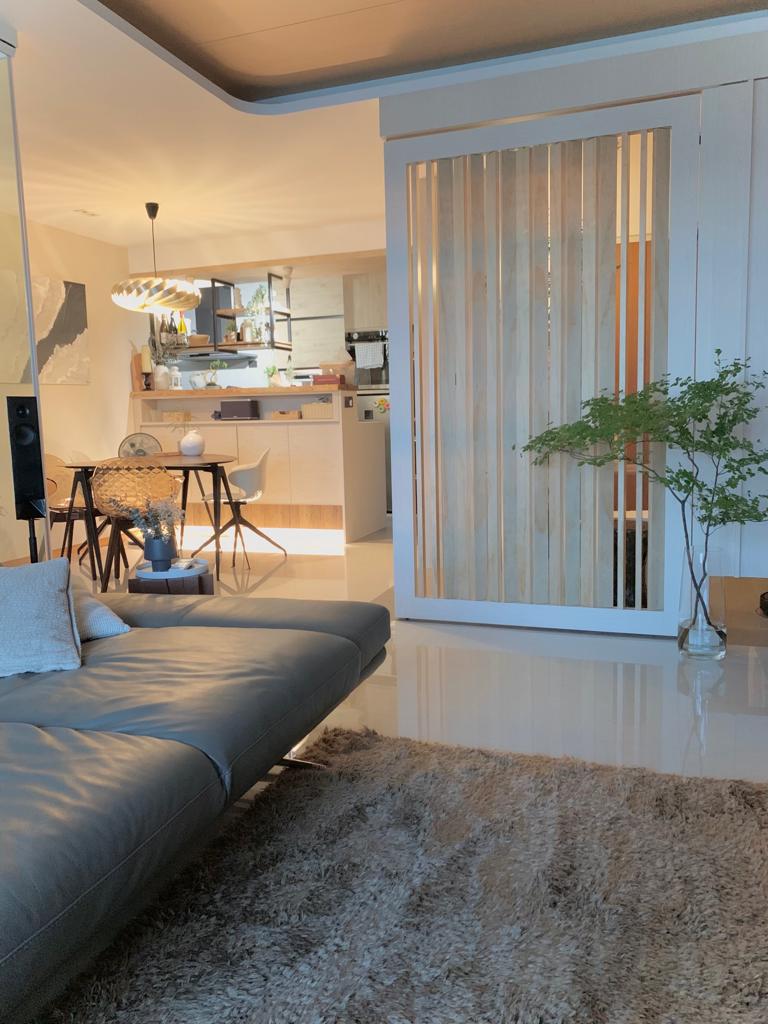 Warm Entryway With Lots Storages | HDB - Japanese Inspired Interior - Modern living room with sleek design, contemporary