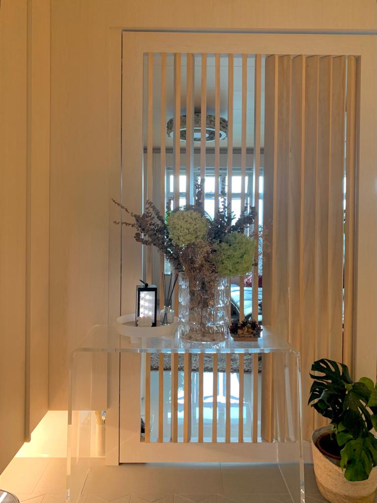 Warm Entryway With Lots Storages | HDB - Japanese Inspired Interior - Clear glass table, vertical blinds, indoor plant