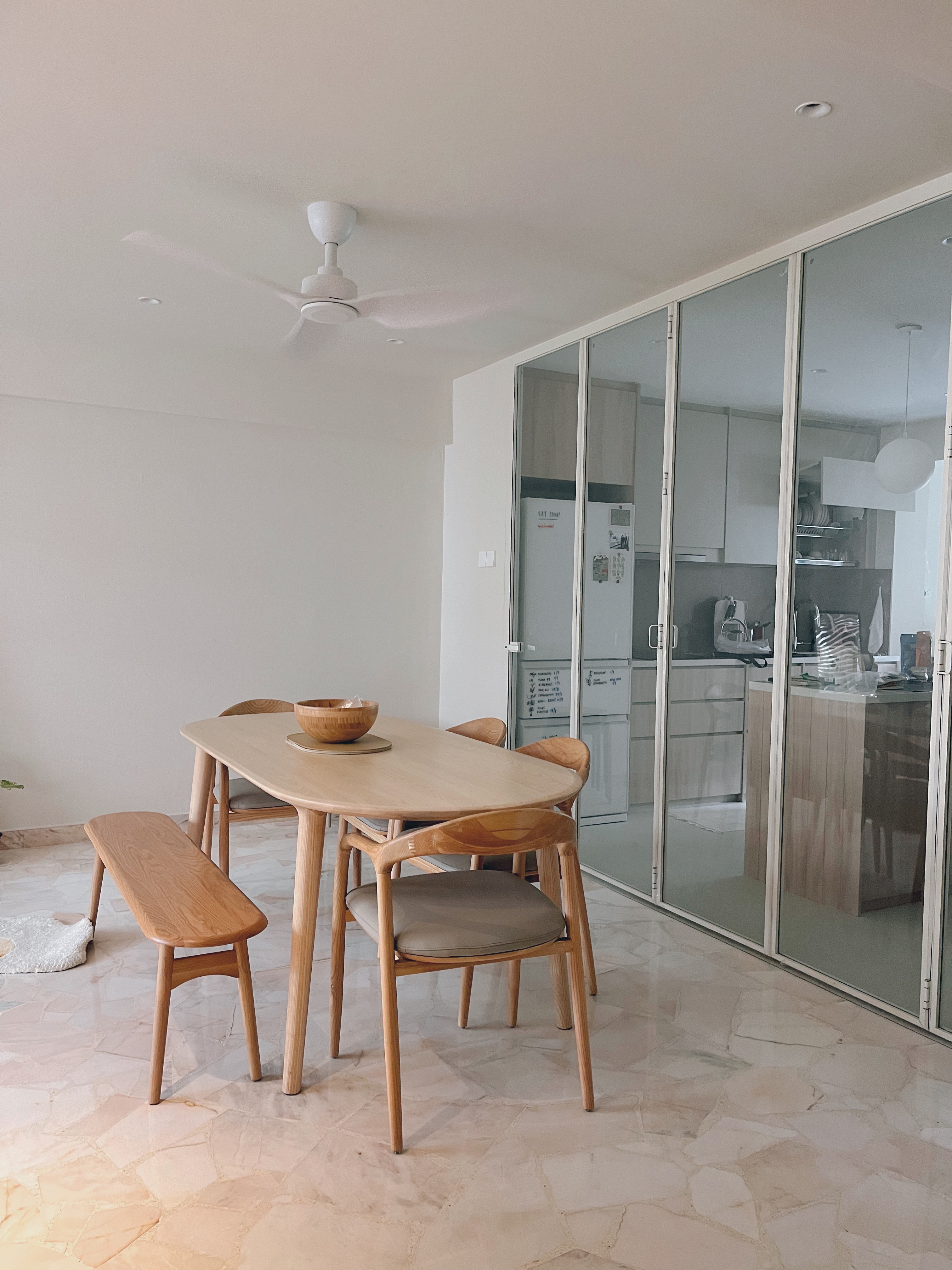 Versatility to gather with those who matter - Modern minimalist dining room with wooden furniture, light beige floor tiles