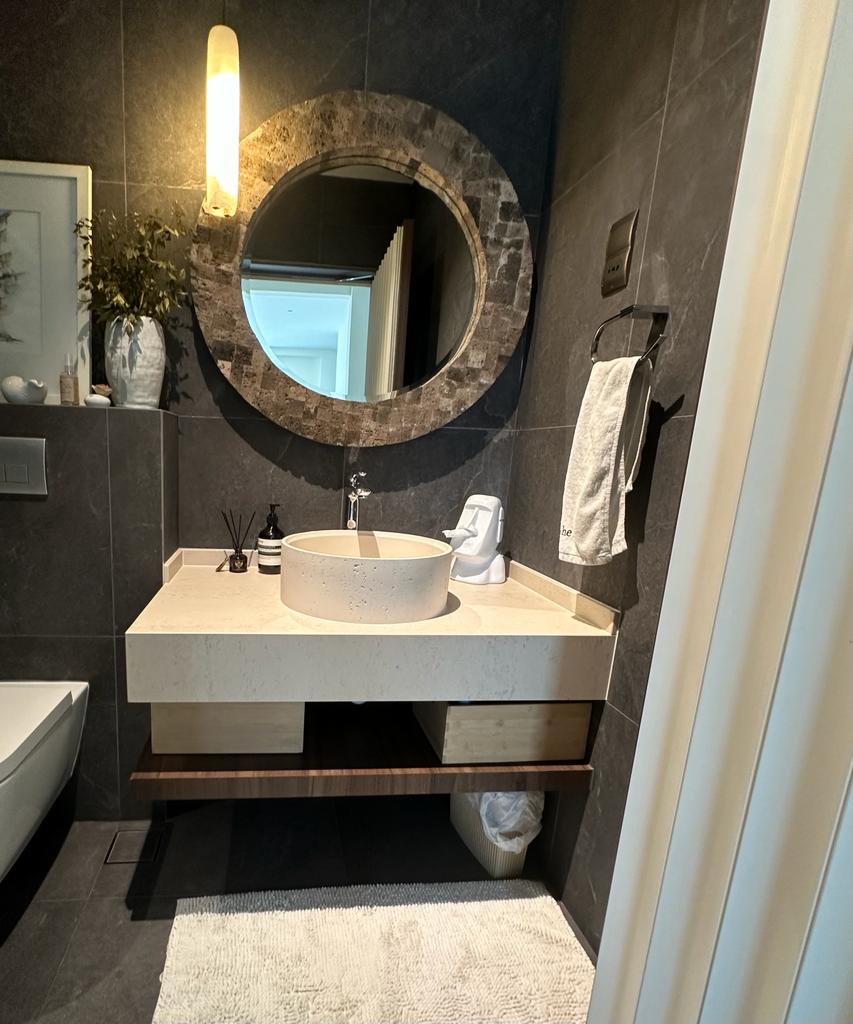 Immerse your senses in a dark and relaxing bathroom