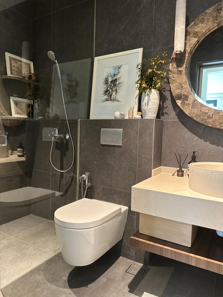 Immerse your senses in a dark and relaxing bathroom