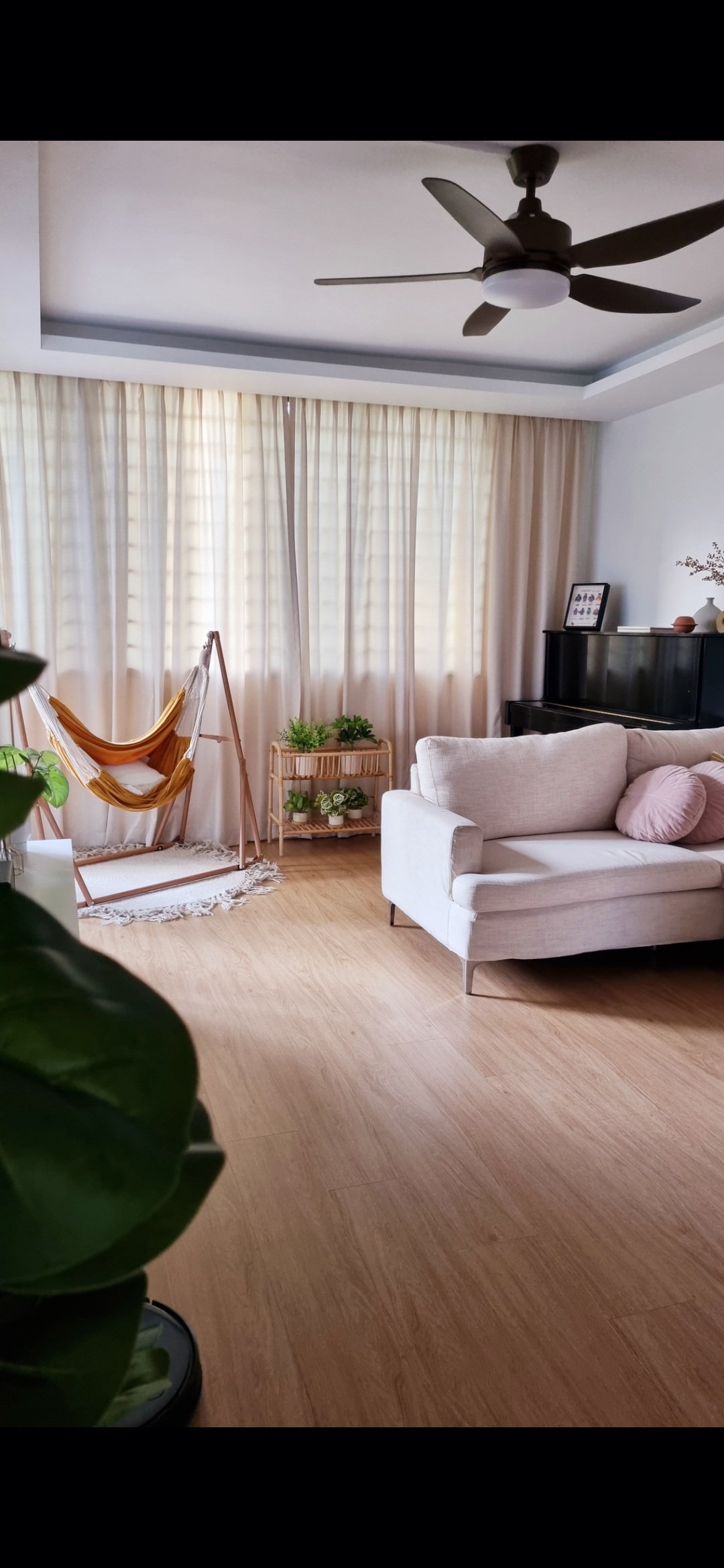 Our COSY little corner - Light wood floor, modern ceiling fan, beige curtains, cozy living room, white sofa, pink cushions