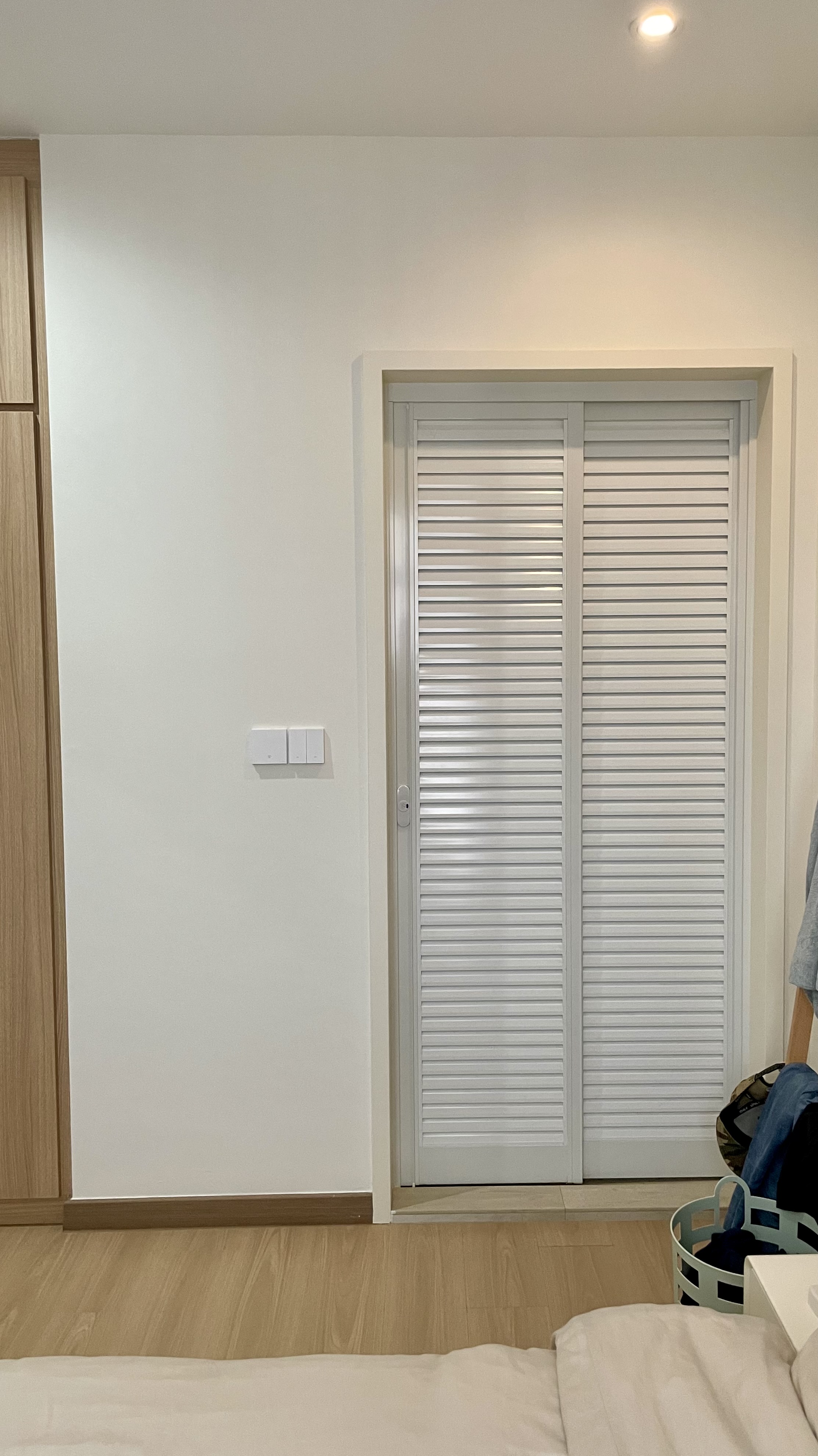 Japandi Bedroom  - Wooden door, white closet, light-colored walls, wooden floor, modern design, minimalistic room, white