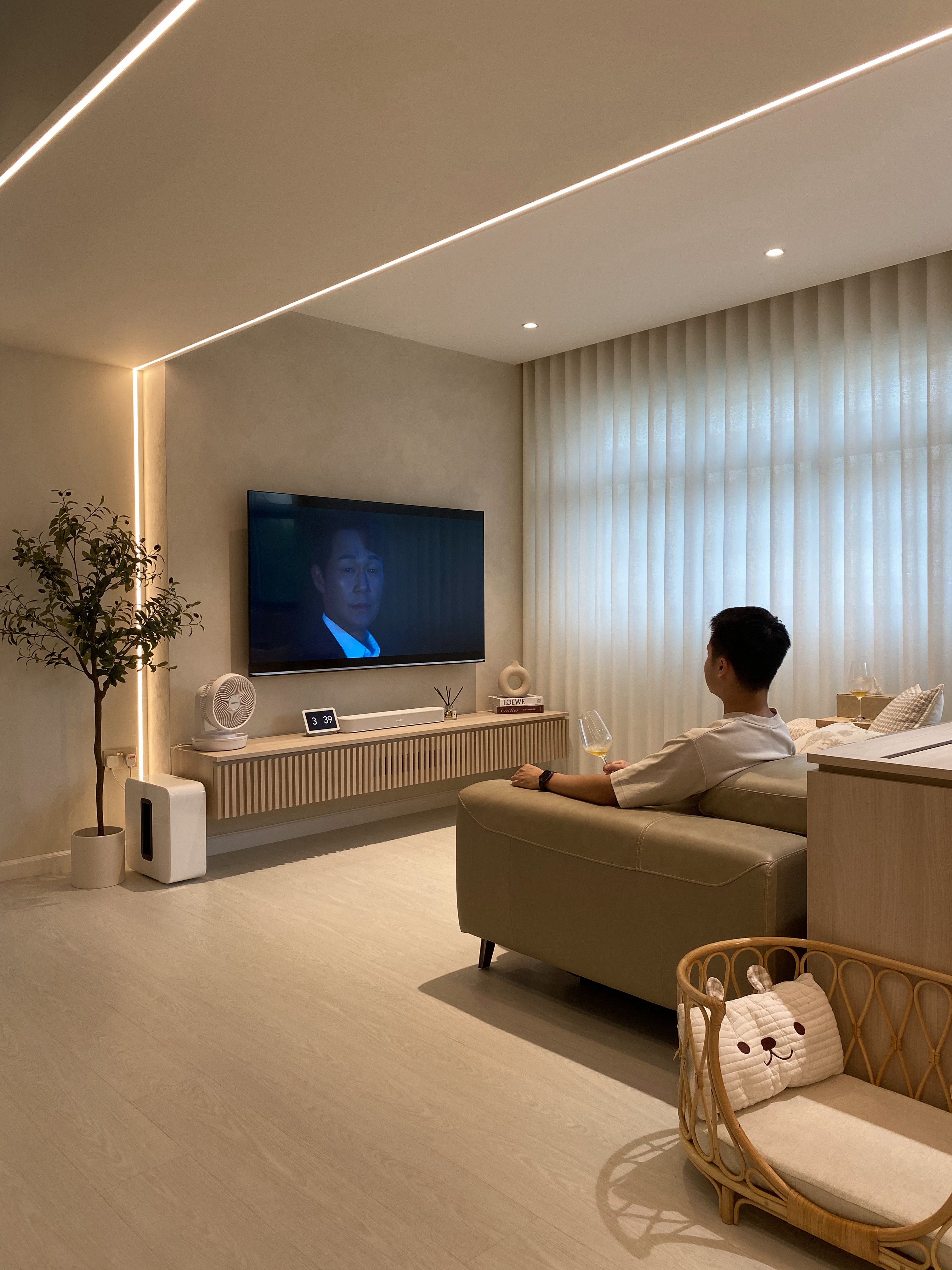 Parts of the house I really Love! - Modern living room, cozy ambiance, minimalist decor, sleek furniture, large flat-screen