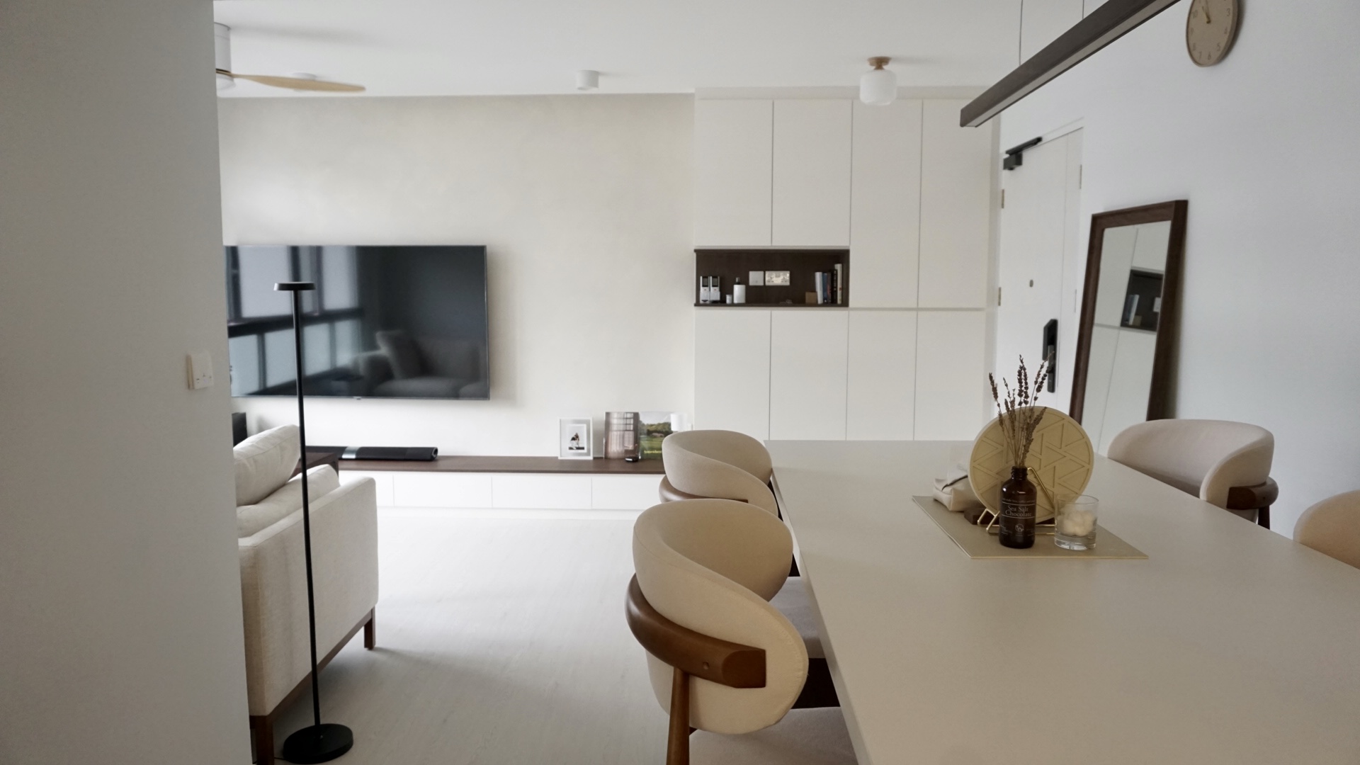 Creating our abode on cloud9, without an ID.  - Modern minimalist living room, sleek furniture design, neutral color palette