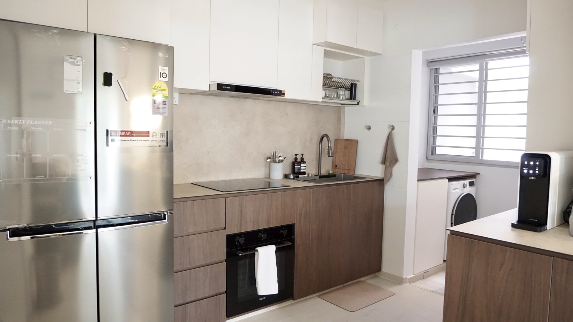 Creating our abode on cloud9, without an ID.  - Modern kitchen with sleek stainless steel refrigerator, wooden cabinets