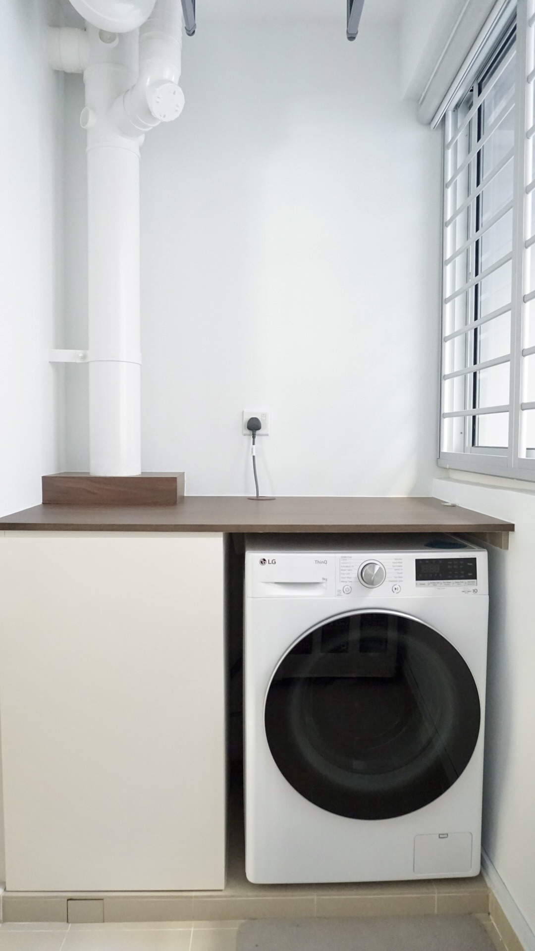 Creating our abode on cloud9, without an ID.  - White laundry room, modern washing machine, LG washing machine, small kitchen