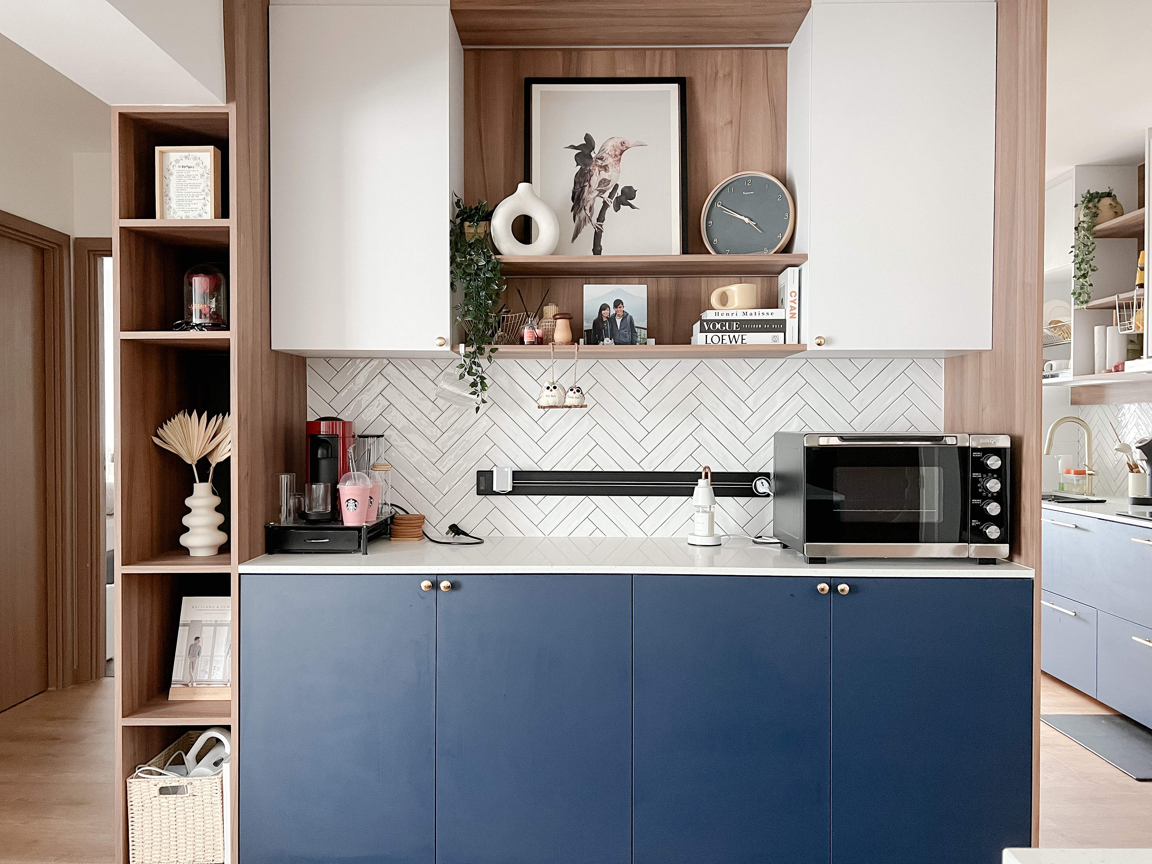 A peek into a 4 Room BTO at Northeast - Wooden shelves, modern kitchen, white and blue cabinets, herringbone tile backsplash