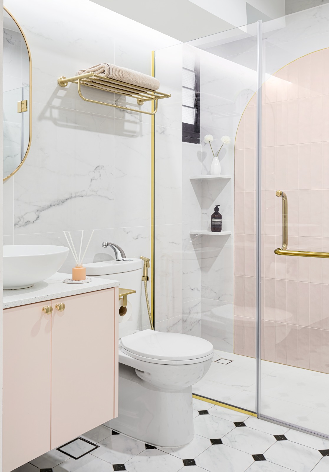 A peek into a 4 Room BTO at Northeast - White marble tiles, gold fixtures, modern design, pink cabinet, white sink, gold